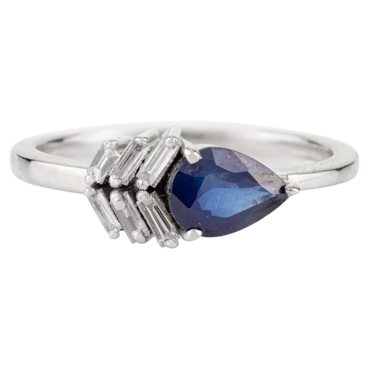 For Sale:  Contemporary Pear-Cut Blue Sapphire and Baguette Diamond Ring in 18k White Gold