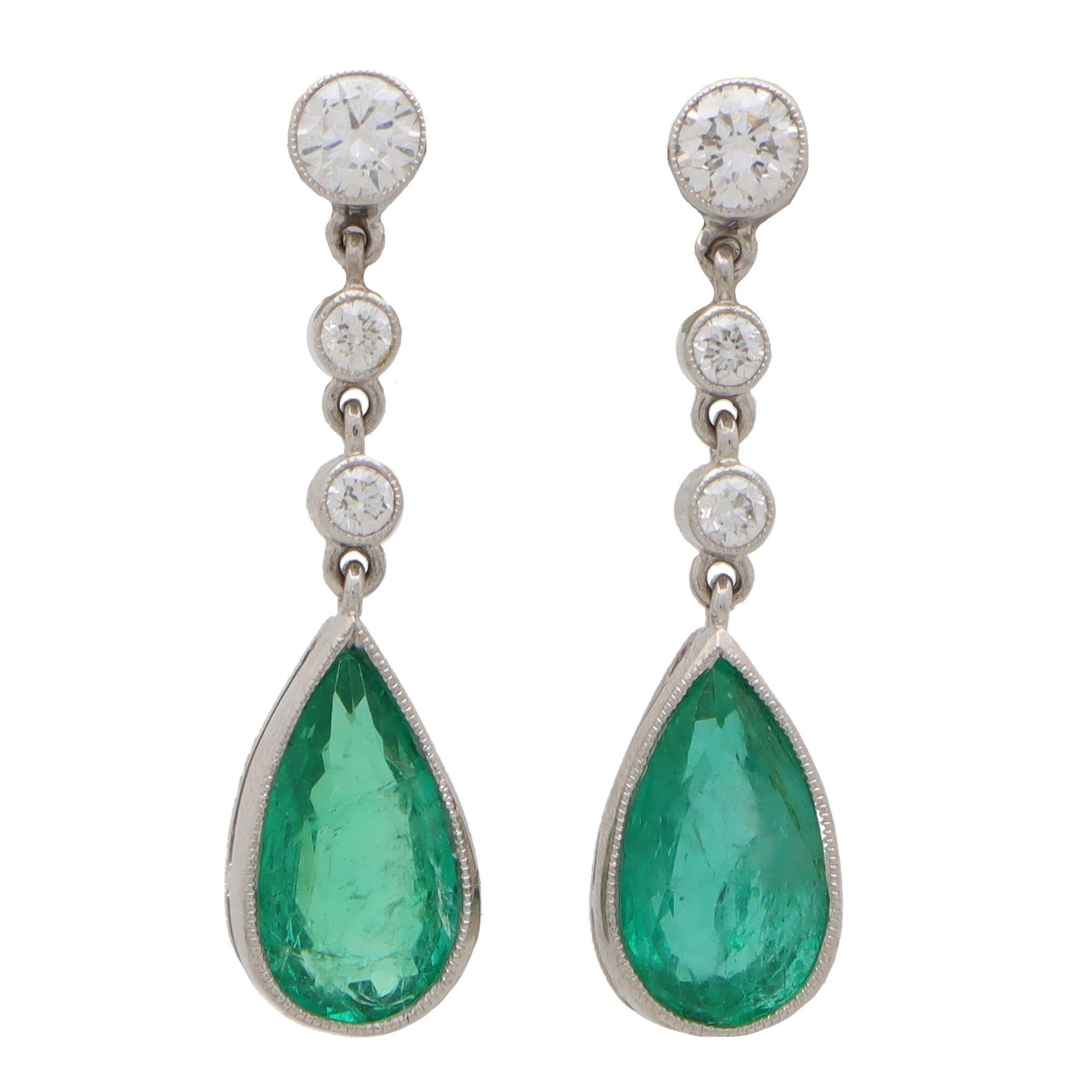 Women's or Men's Contemporary Pear Cut Emerald and Diamond Drop Earrings Set in 18k White Gold For Sale