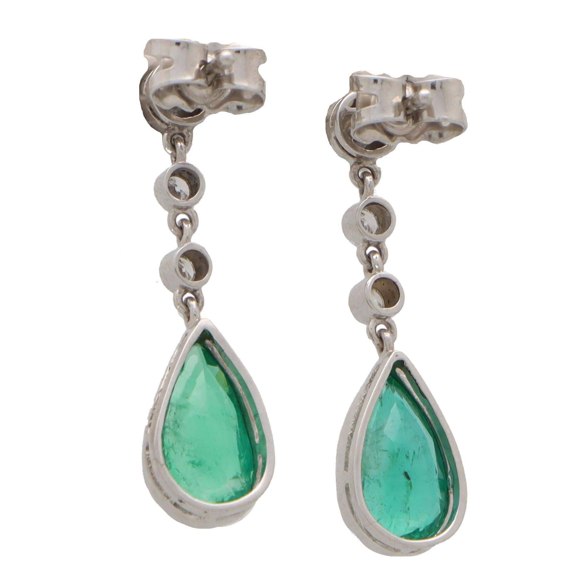 Contemporary Pear Cut Emerald and Diamond Drop Earrings Set in 18k White Gold For Sale 1