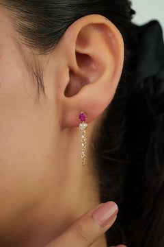 Contemporary Pear Cut Red Ruby & Diamond Chain Drop Earrings in 14K Yellow Gold