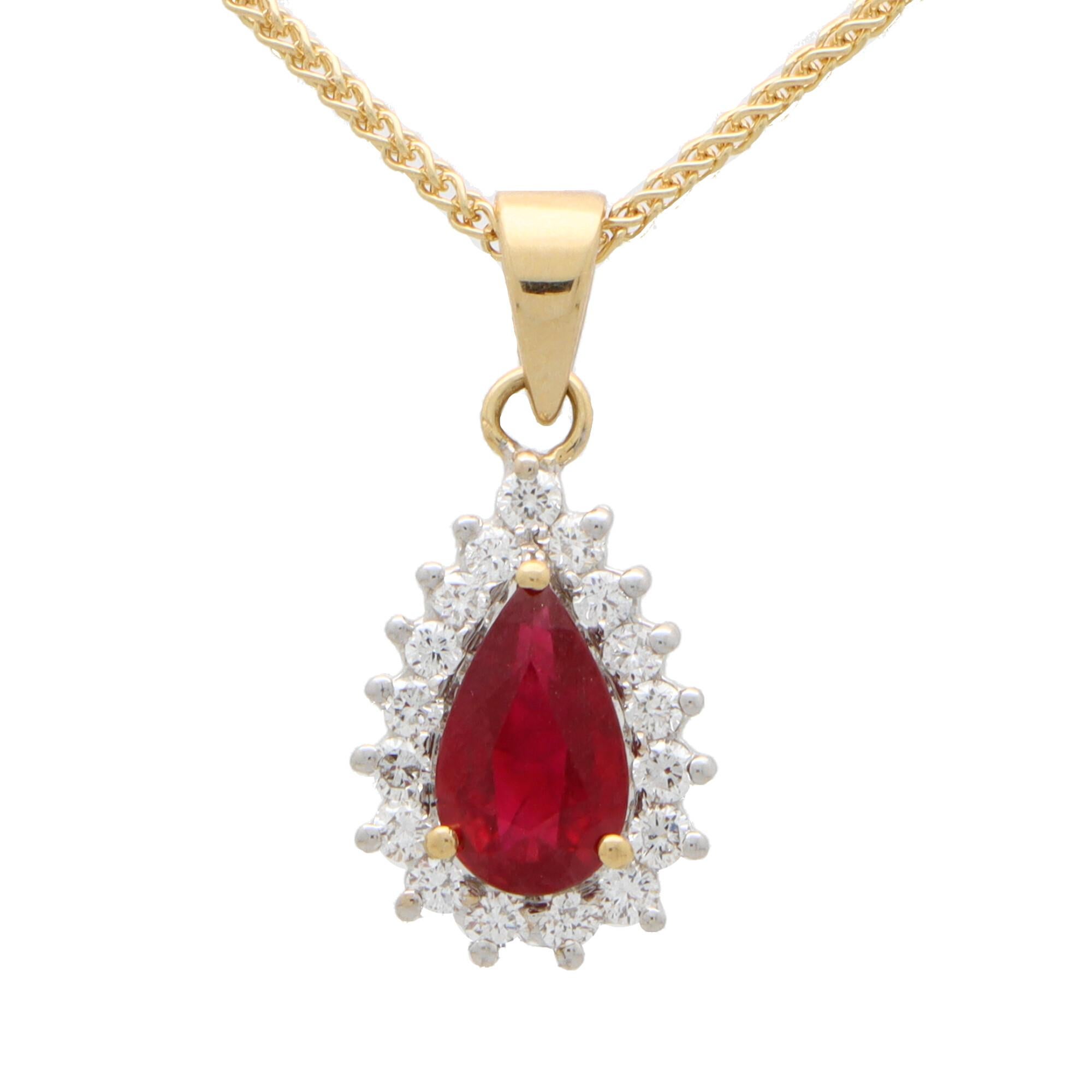 Contemporary Pear Cut Ruby and Diamond Pendant Set in 18k Yellow and White Gold For Sale