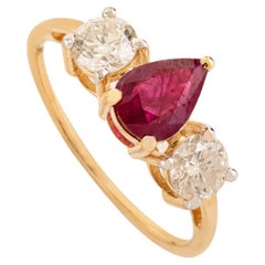 Contemporary Pear Cut Ruby & Diamond Trilogy Ring in Solid 18K Yellow Gold