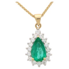 Contemporary Pear Shape Emerald and Diamond Cluster Pendant Set in 18k Gold