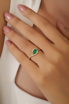 Contemporary Pear-Shaped Emerald & Diamond Halo Bypass Ring in 14K Yellow Gold