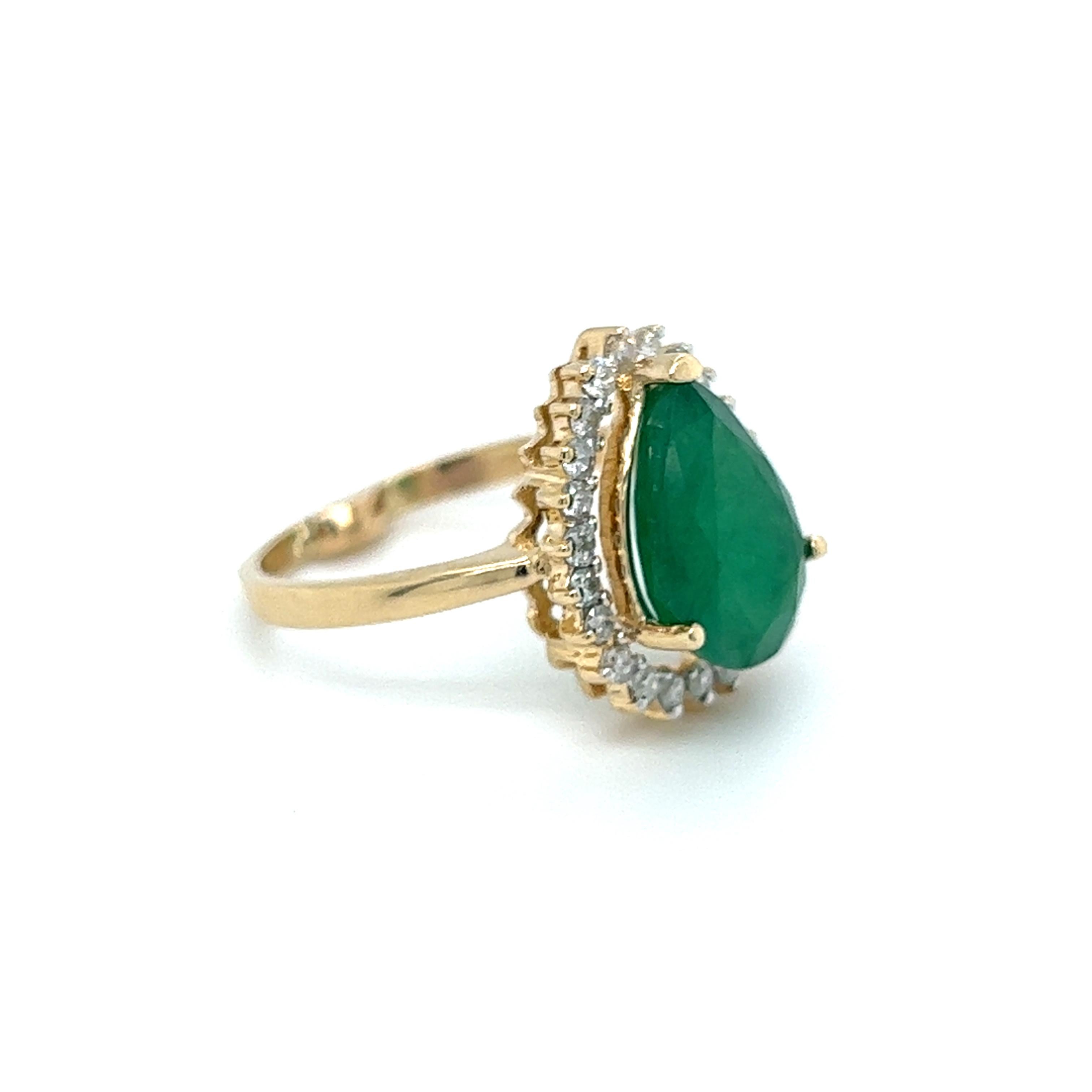 Contemporary Pear Shaped Emerald Diamond Halo Ring in 14K Yellow Gold In Good Condition In Towson, MD