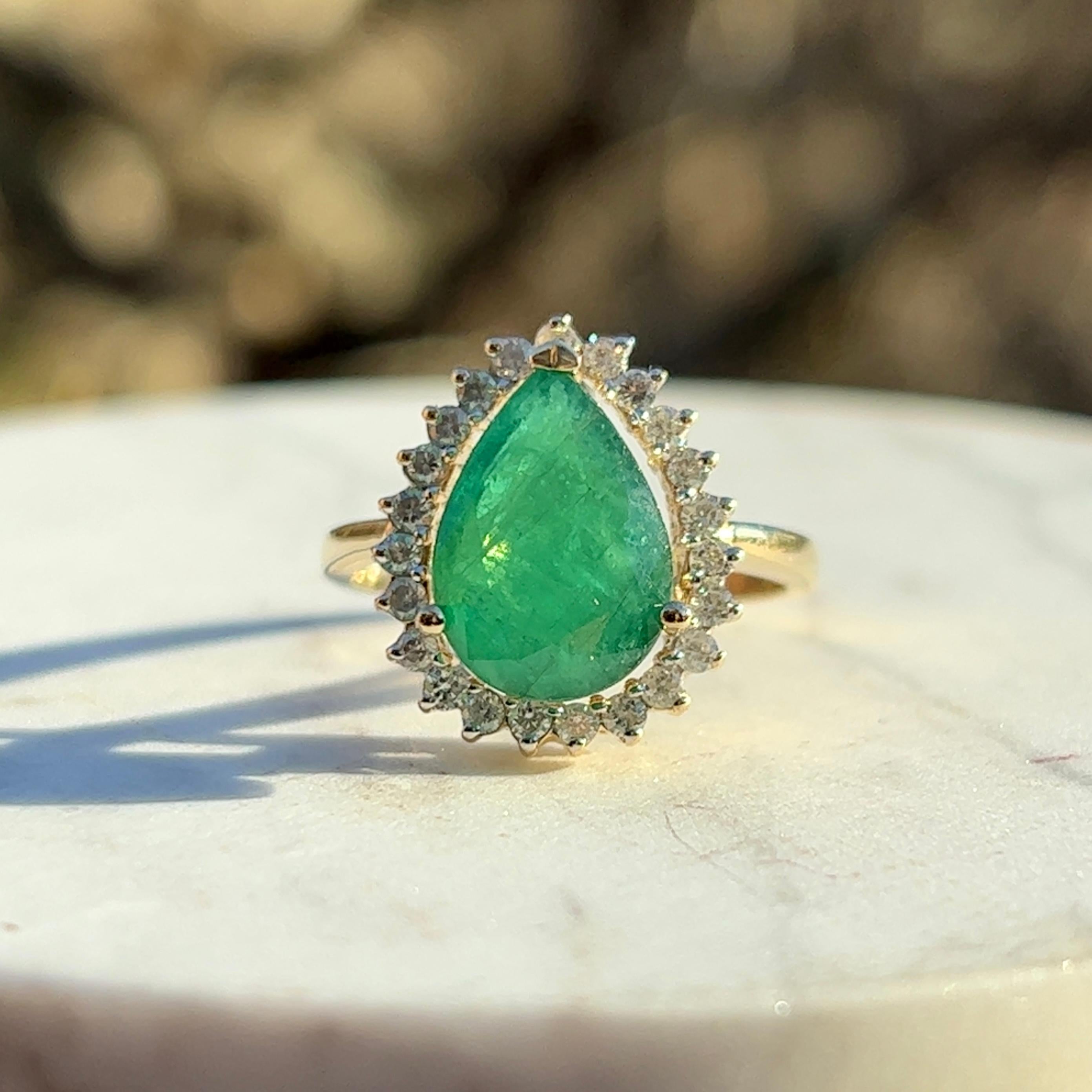 Contemporary Pear Shaped Emerald Diamond Halo Ring in 14K Yellow Gold 4