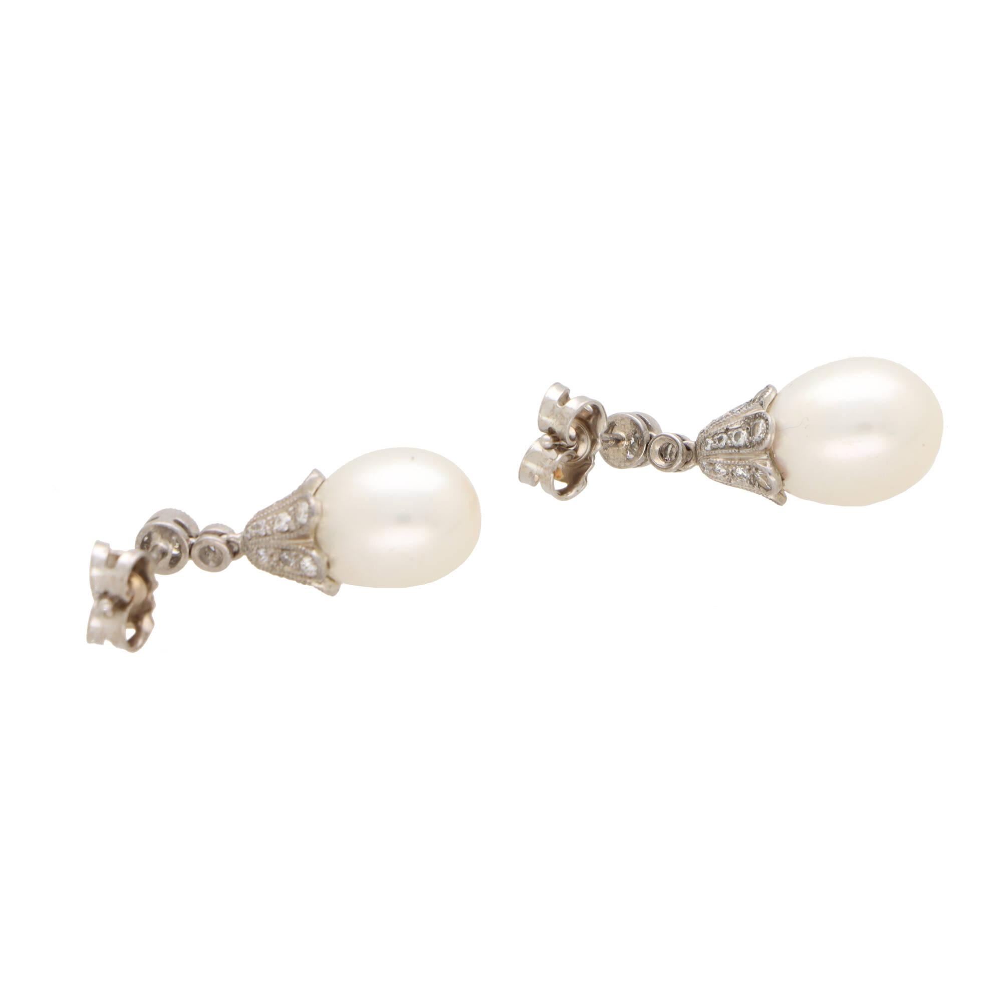 Round Cut  Contemporary Pearl and Diamond Drop Earrings in 18k White Gold For Sale