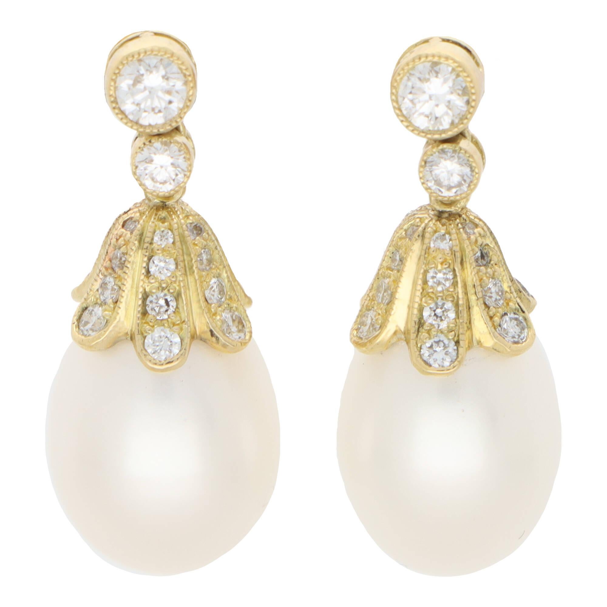 Round Cut  Contemporary Pearl and Diamond Drop Earrings in 18k Yellow Gold For Sale
