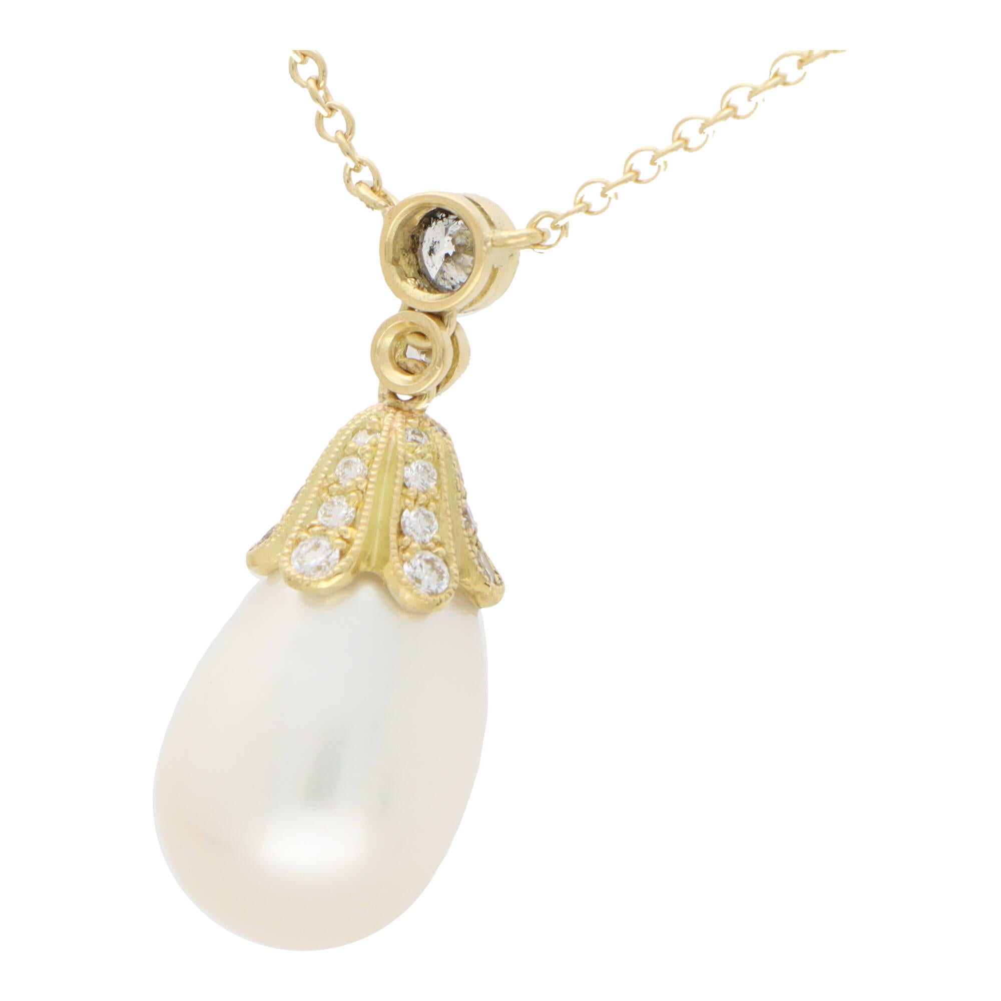 A fabulous pearl and diamond pendant necklace set in 18k yellow gold.

The pendant prominently features a 10 x 12-millimetre tear drop shaped pearl that elegantly hangs from a diamond set cap and diamond bail. The pendant currently hangs from a
