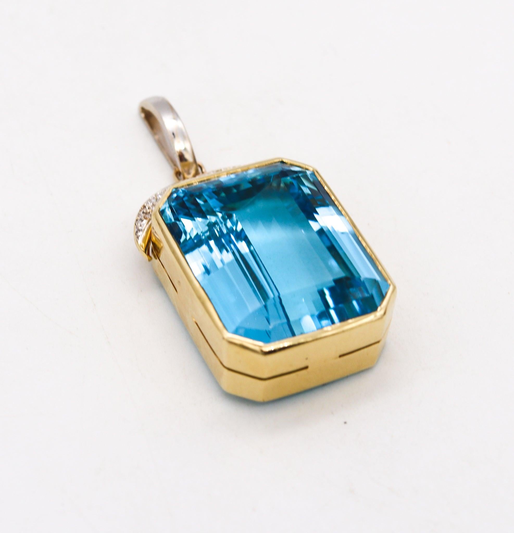A large pendant with an Aquamarine.

This is a beautiful contemporary oversized pendant, crafted in solid yellow and white gold of 18 karats with high polished finish. It is embellished with thirty-six natural earth mined gemstones, such white