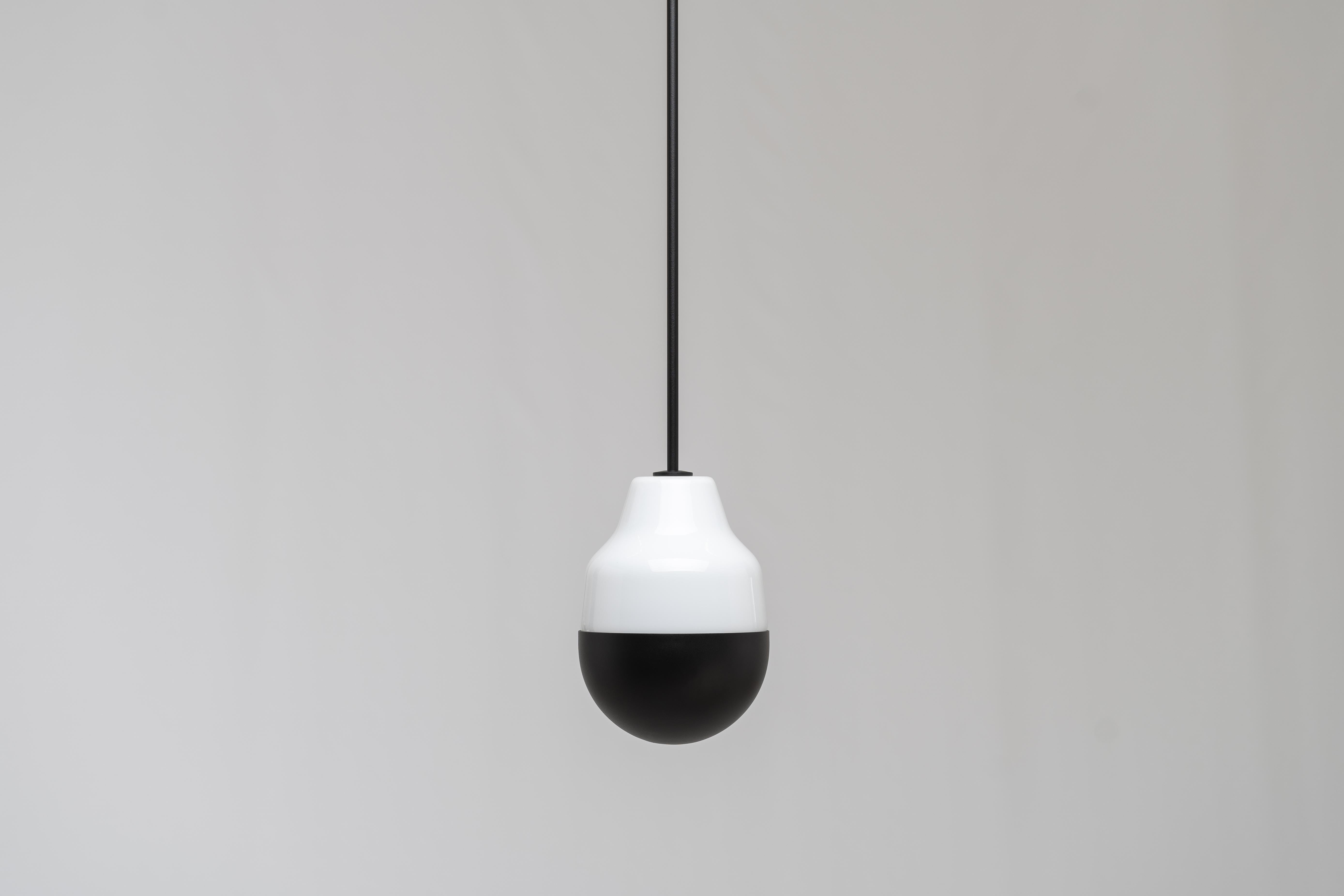 Ambiguo type-02 by Saarepera & Mae
Pendant lamp

Materials: mouth-blown Murano glass / stainless steel and aluminum
Light source: Built-in LED 100-240V / Dimmable

Dimensions: 
H 23.6cm / 9.3 in
D 17cm / 6.7 in

Fixing: 
Hanging from a