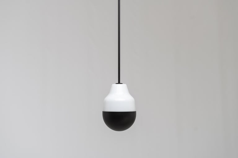 Ambiguo type-02 by Saarepera & Mae
Pendant lamp

Materials: mouth-blown Murano glass / stainless steel and aluminum
Light source: Built-in LED 100-240V / Dimmable

Dimensions: 
H 23.6cm / 9.3 in
D 17cm / 6.7 in

Fixing: 
Hanging from a