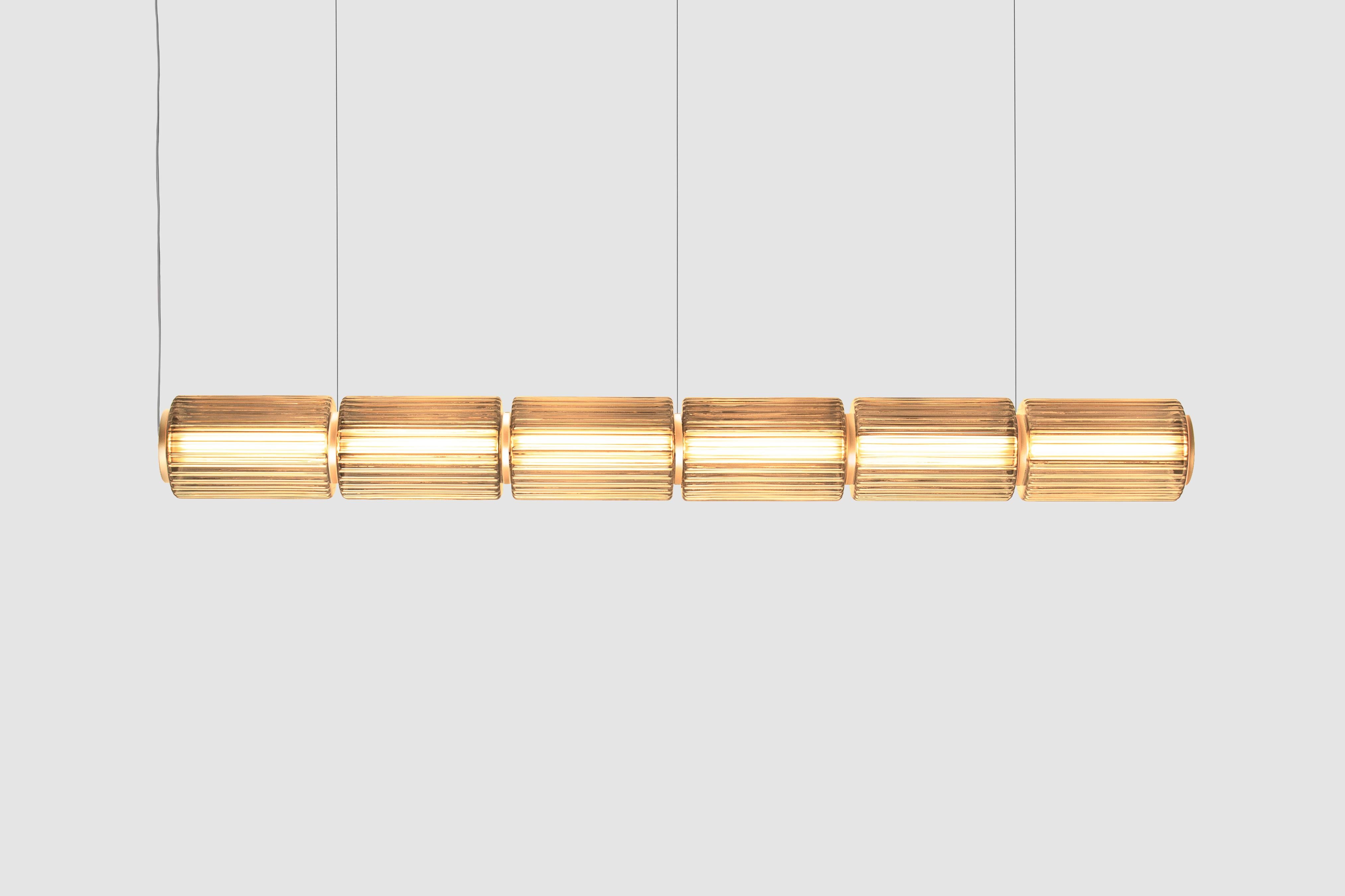 Contemporary Pendant Lamp 'Column' 175 
Designer: Lukas Peet

Electrical : 
Voltage: 110–120V, 220–240V, 110–277V 
Lamp: 12W 24V DC LED 

The model shown in main image: COL-175-6-P-H
- Size : 172cm Length / Ø 17.5cm 7” Diameter
- Finish : Amber
-