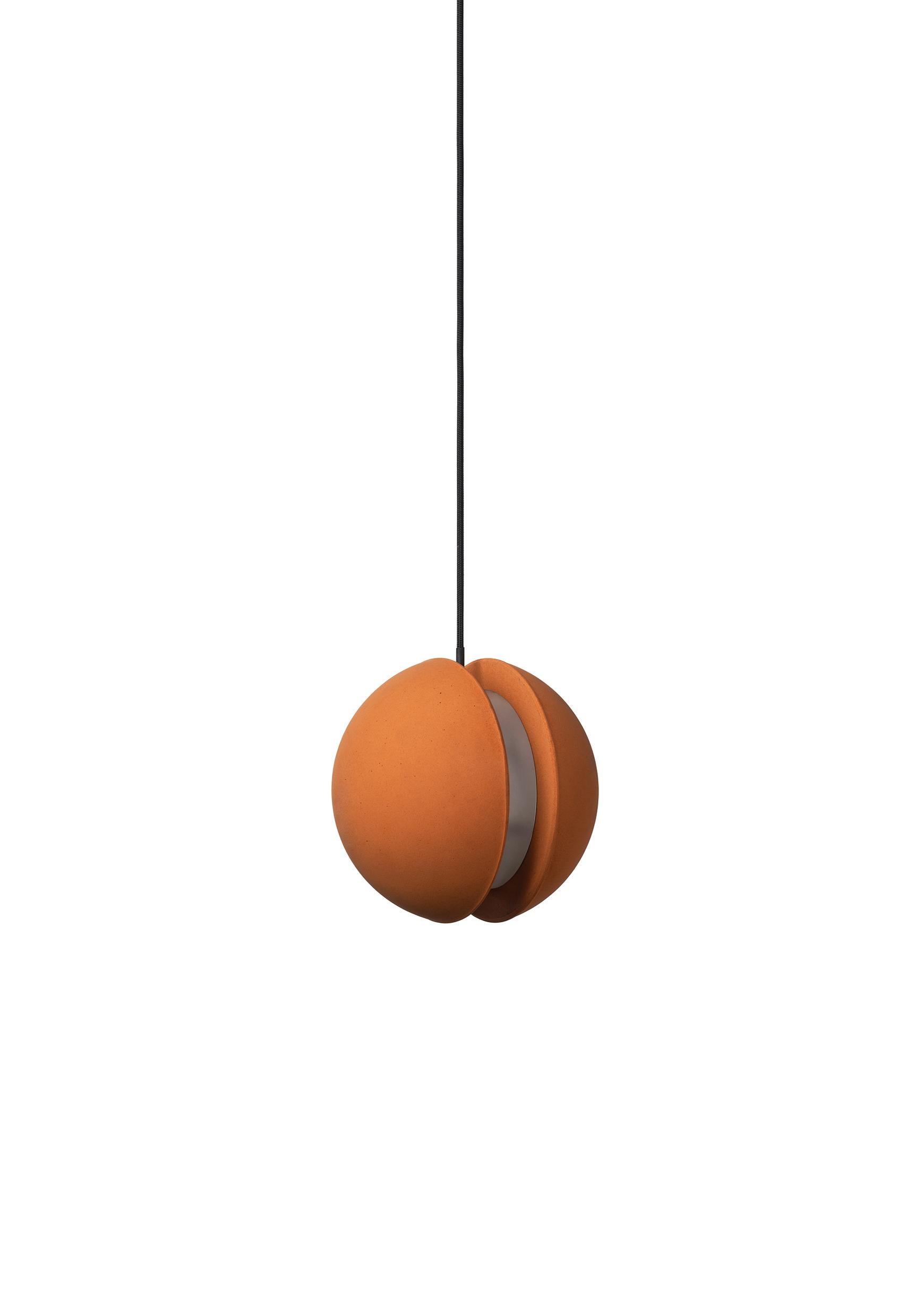Pendant lamp 'E-mars' by Nongzao x Bentu Design.
Material: Terracotta 
Color: Earthy orange 

Measures: 12,7 cm high, 13 cm diameter
Wire: 3 meters (black)
Lamp type: AC 100-240V 50-60Hz  9W - Comptable with US electric system.

Variations:
- Color: