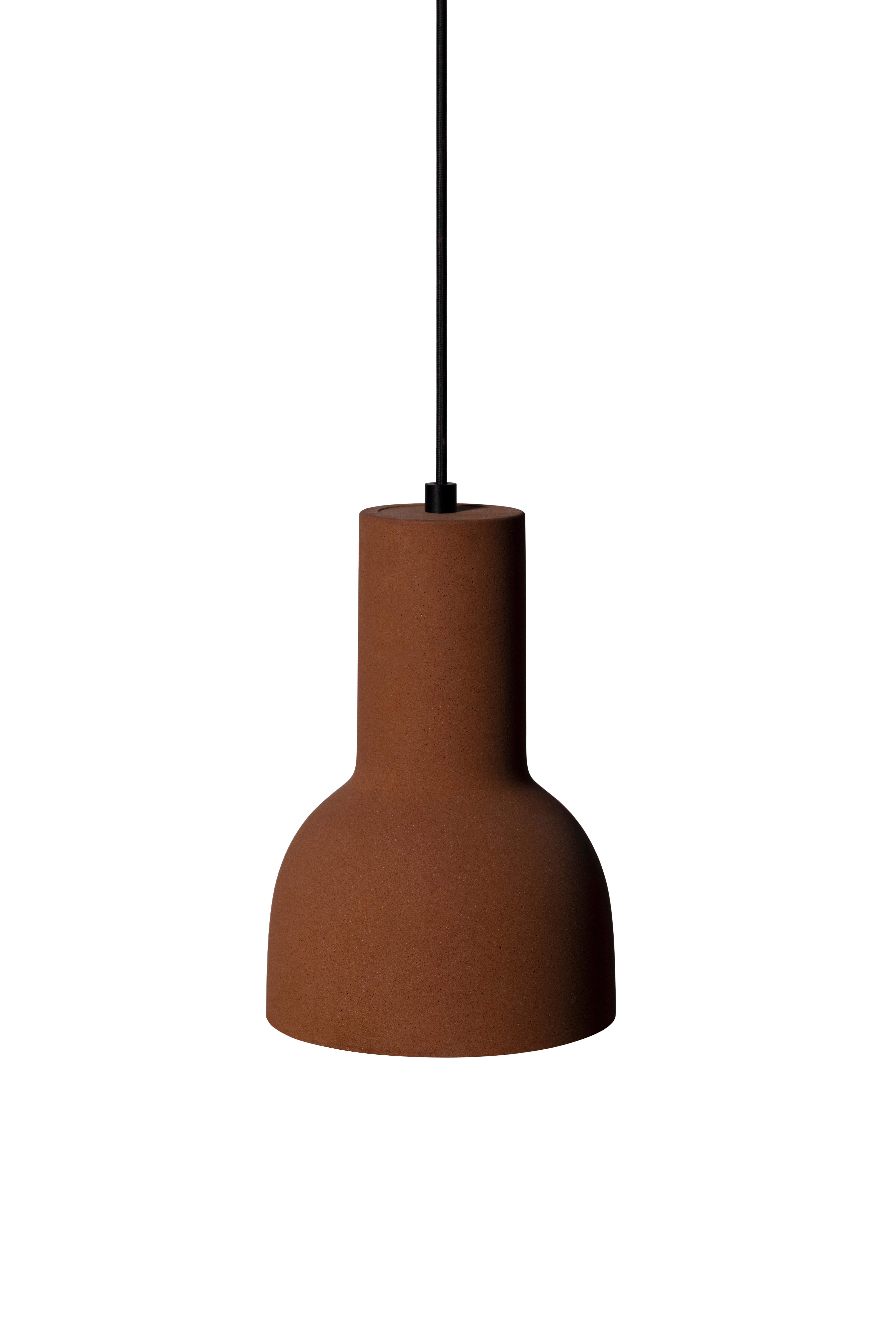 Pendant lamp 'Echo' by Nongzao x Bentu Design.
Material: Terracotta 
Color: Earthy orange 

Measures: 30 cm high, 20 cm diameter
Wire: 3 meters (black)
Lamp type: AC 100-240V 50-60Hz  9W - Comptable with US electric system.

Variations:
- Color: