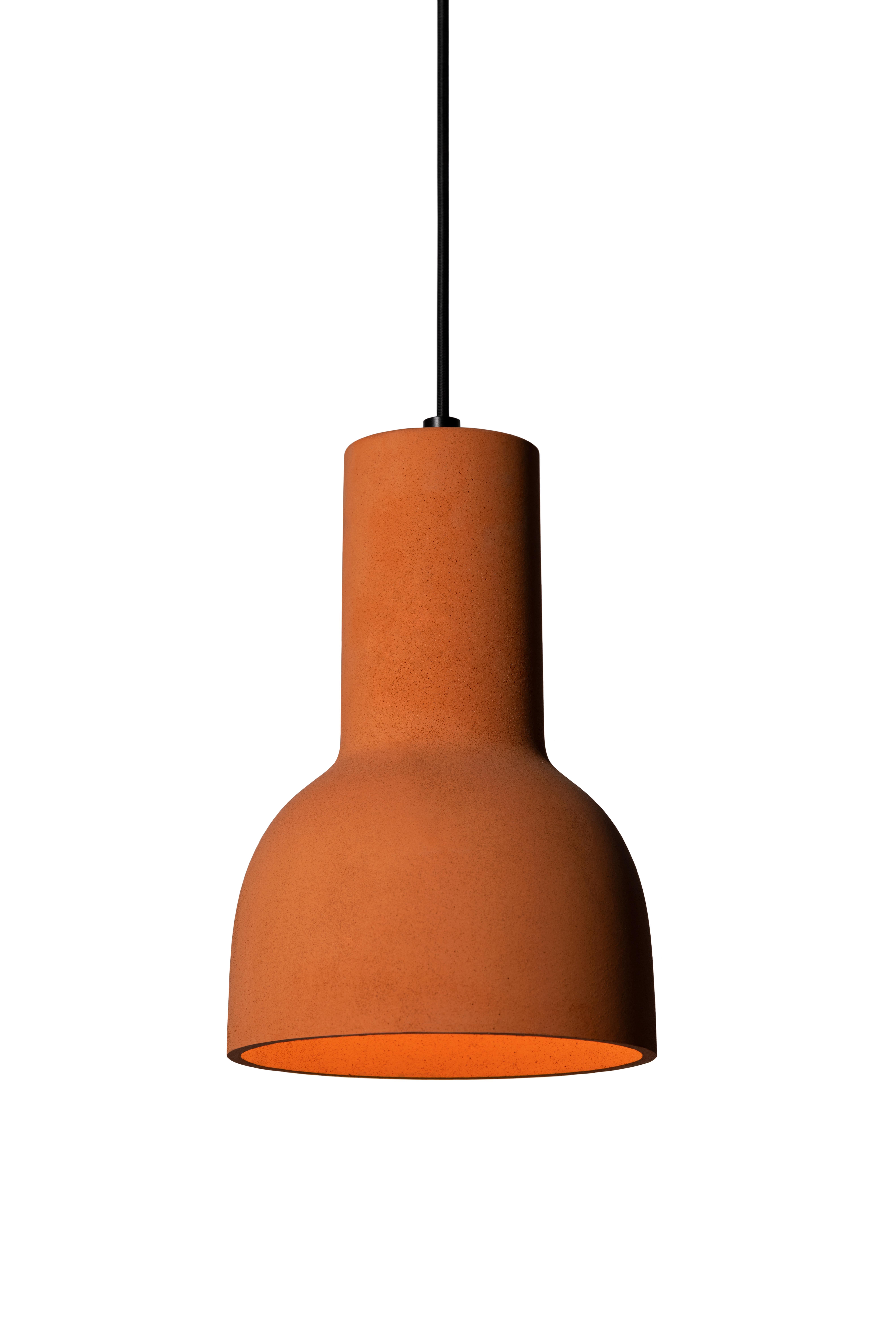 Pendant lamp 'Echo' by Nongzao x Bentu Design.
Material: Terracotta 
Color: Earthy orange 

Measures: 30 cm high, 20 cm diameter
Wire: 3 meters (black)
Lamp type: AC 100-240V 50-60Hz 9W - Comptable with US electric system.

Variations:
-