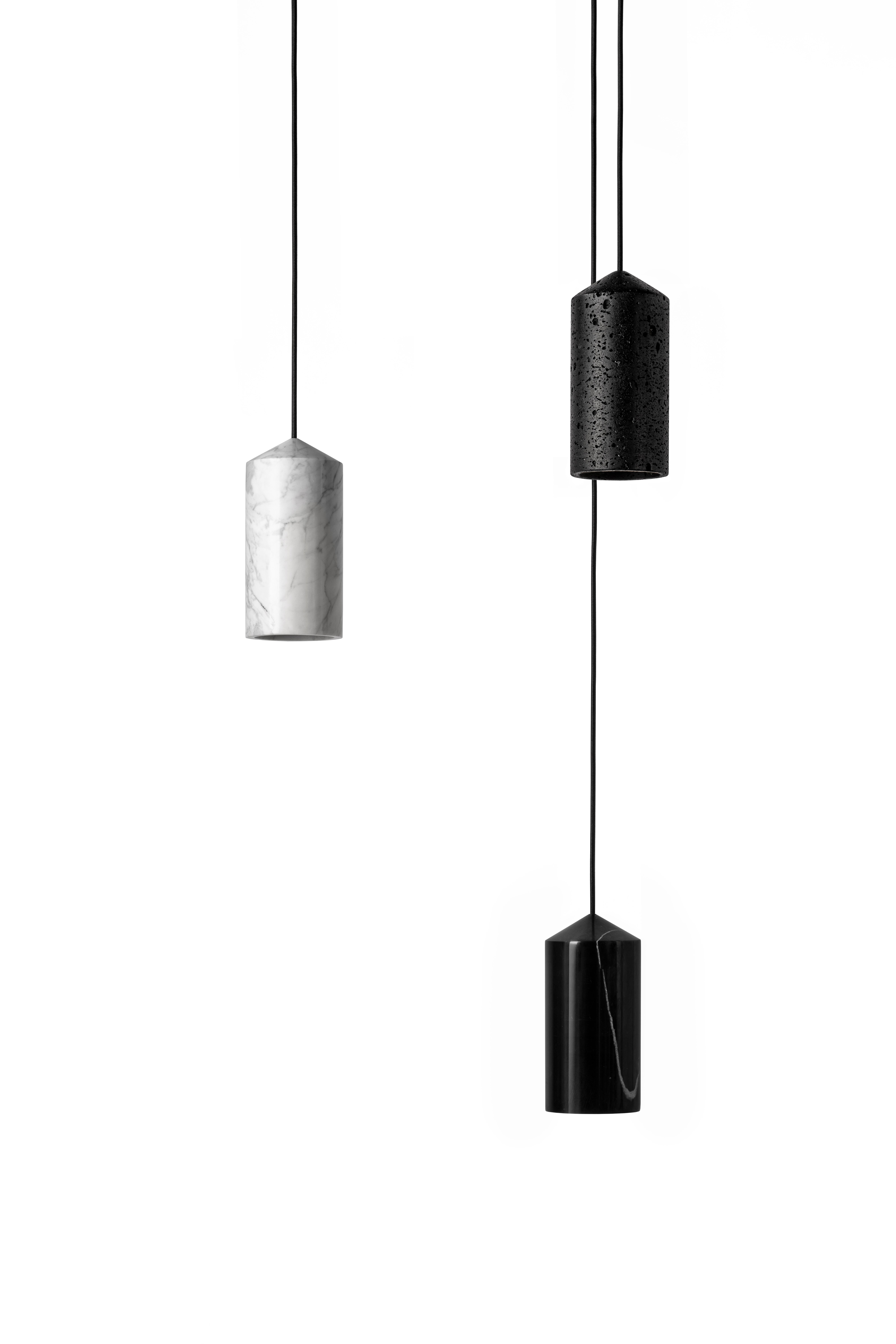 Pendant lamp 'IN' by Buzao x Bentu design.
Black marble

Measures: 23 cm high, 11 cm diameter
Wire: 2 meters black (adjustable)
Lamp type: E27 LED 3W 100-240V 80Ra 200LM 2700K - Comptable with US electric system.
Ceiling rose 6.5cm diameter