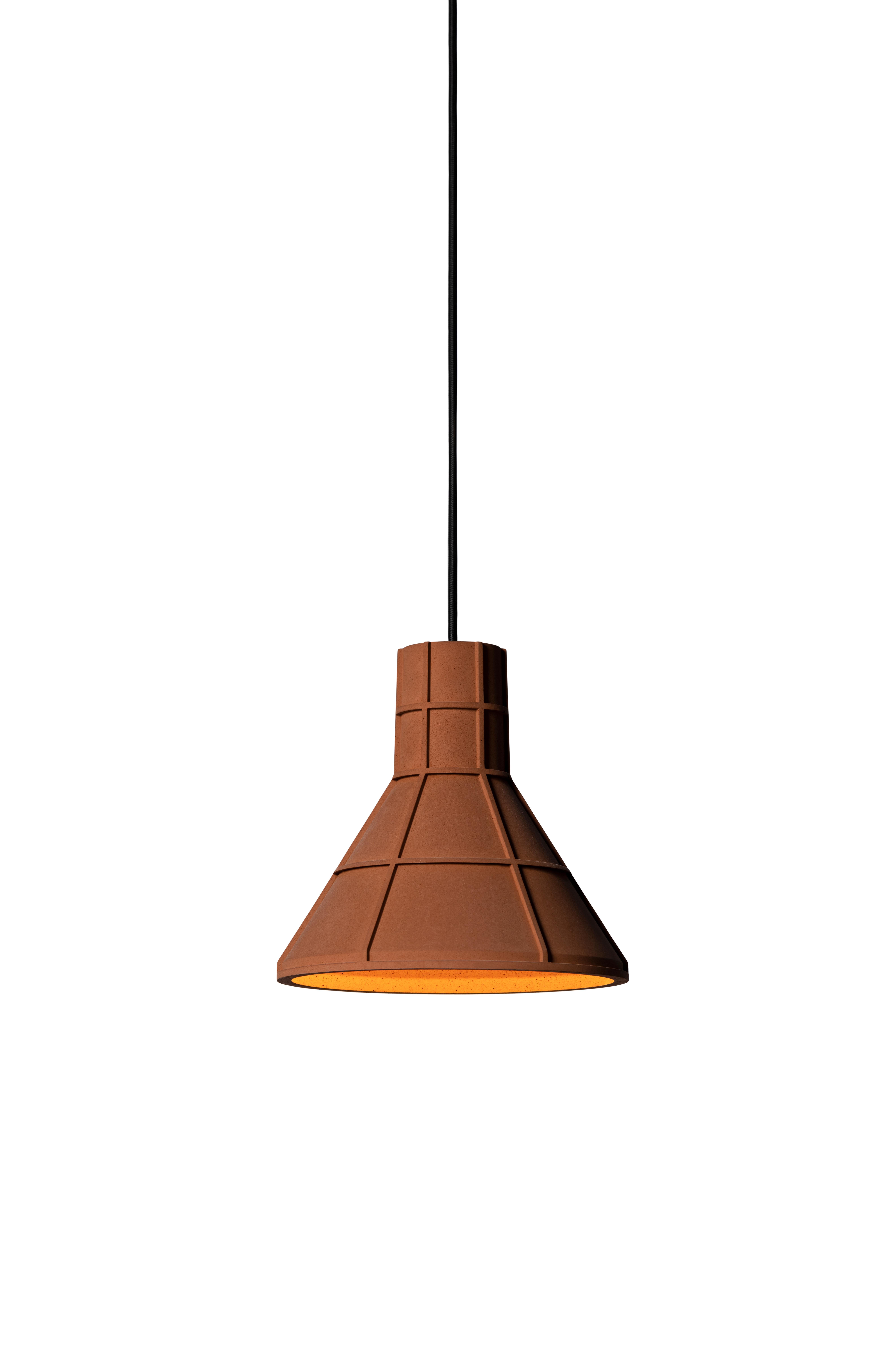 Pendant lamp 'U' by Nongzao x Bentu design.
Material: Terracotta 
Color: earthy brown

Measures: 21.1 cm high, 22.2 cm diameter
Wire: 3 meters (black)
Lamp type: AC 100-240V 50-60Hz  9W - Comptable with US electric system.

Variations:
- Color: