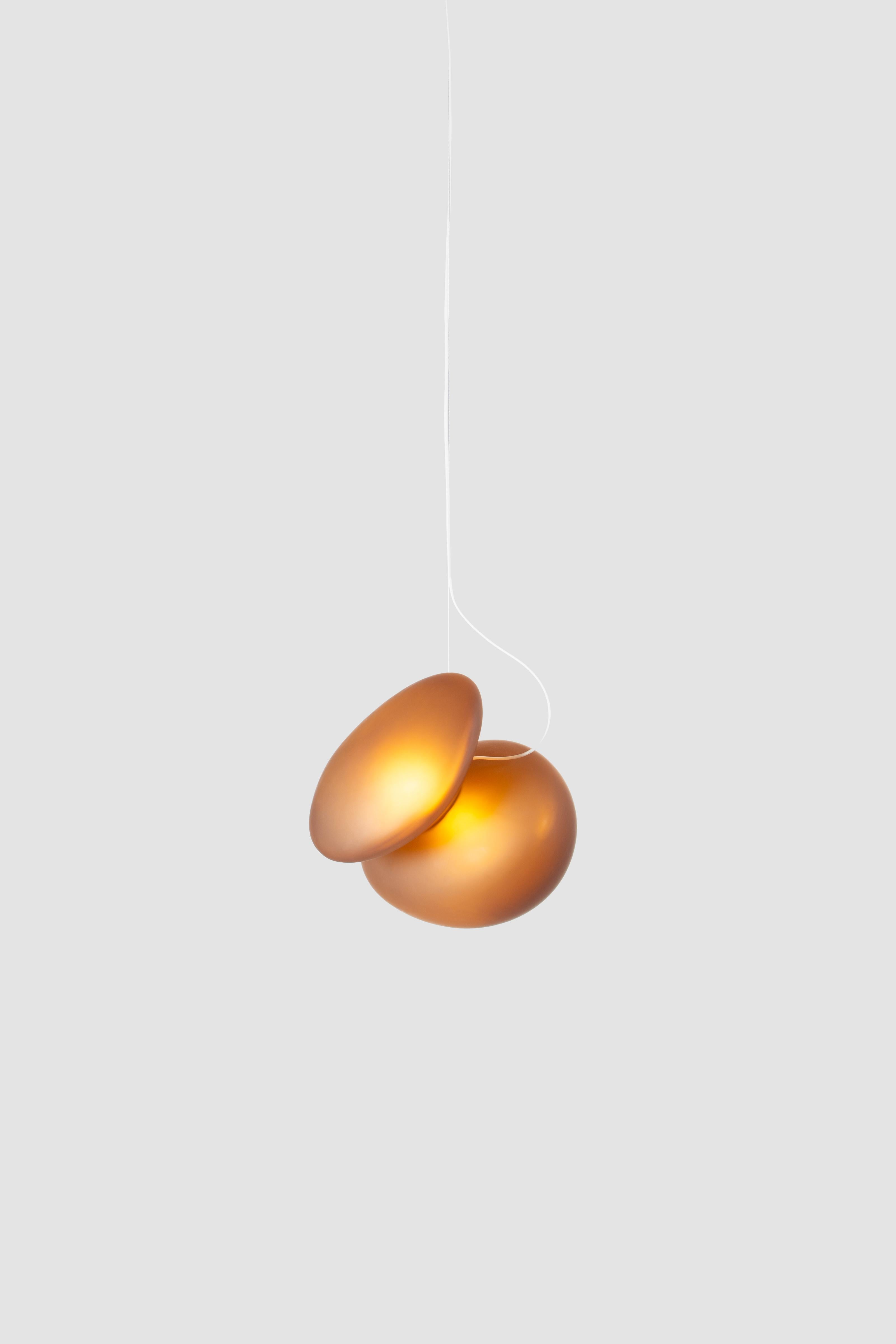 'Pebble' Contemporary pendant lamp 

Model in the picture: 
Color: All citrine
Shapes: A + C

Wire length: 243 cm
Electrical: 14W LED 300ma, 2700K, Dimming: 0–10/ Triac

Available in white pearl, grey slate and yellow citrine. 
Different
