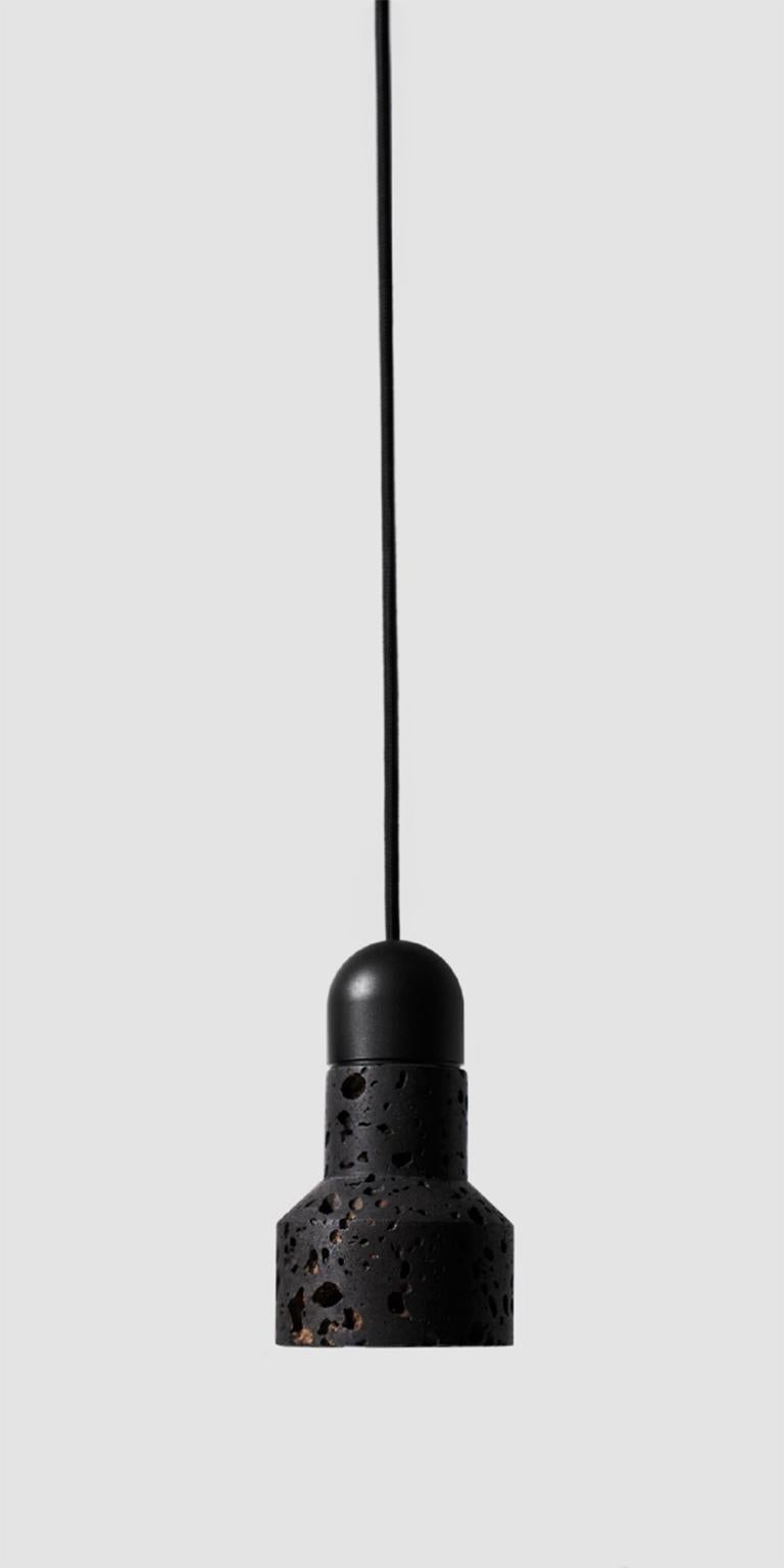 Lava Contemporary pendant lamp 'QIE' in black lava stone (brass finish) For Sale