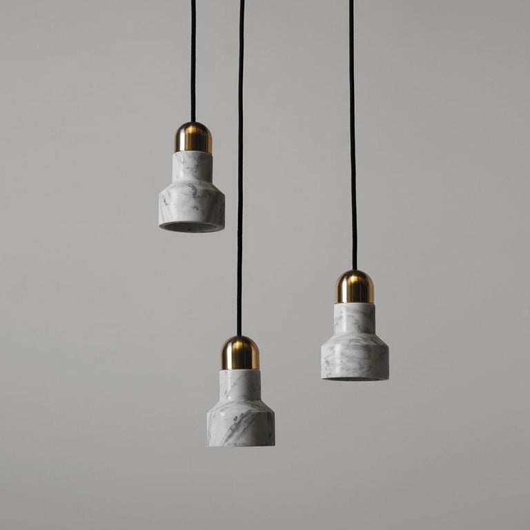Contemporary pendant lamp 'QIE' in black lava stone (brass finish) For Sale at 1stDibs