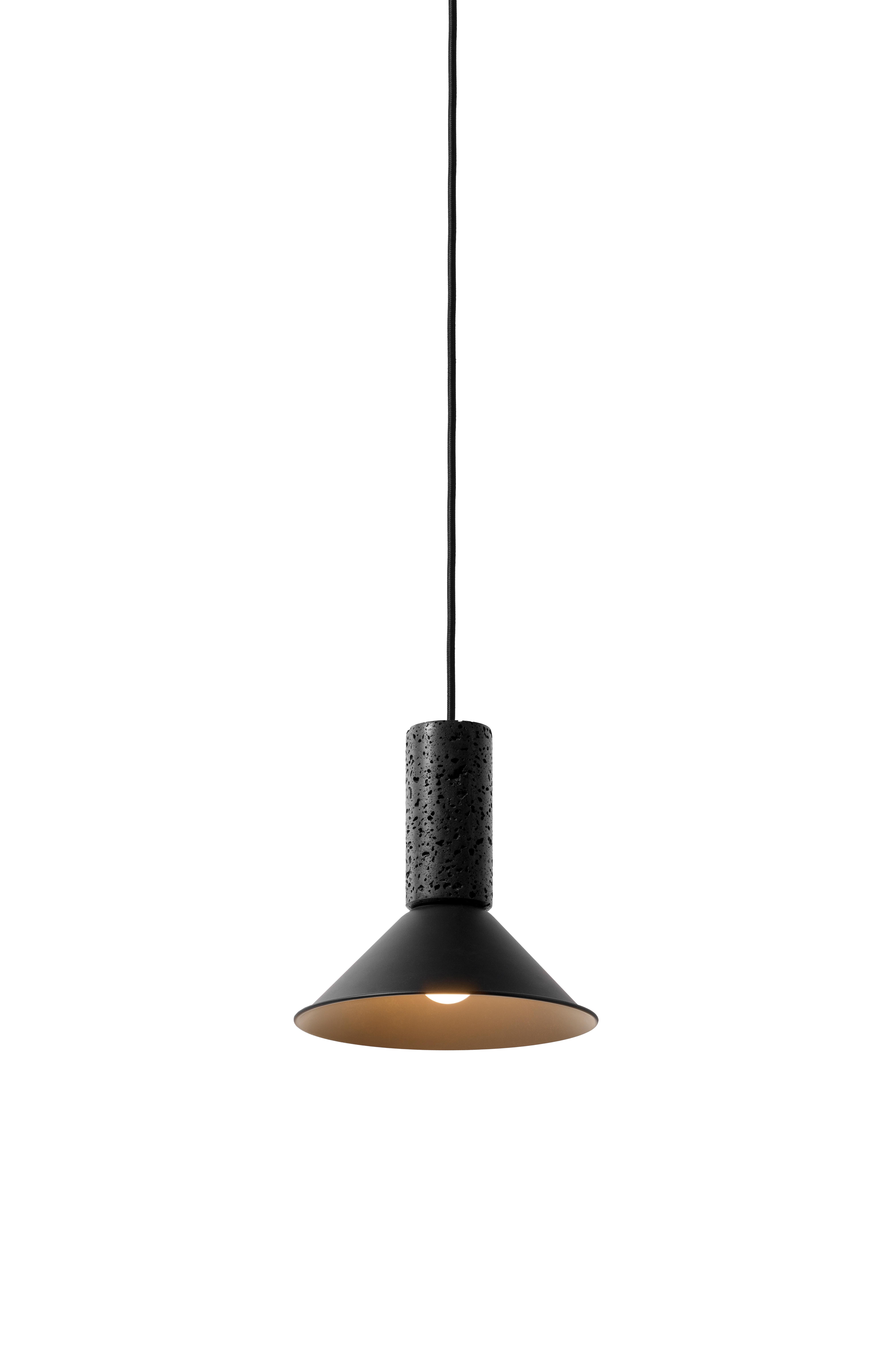 Pendant lamp 'R' by Buzao x Bentu design.
Black lava stone and black aluminum

Measures: 21 cm high, 21 cm diameter
Wire: 2 meters black (adjustable) 
Lamp type: E27 LED 3W 100-240V 80Ra 200LM 2700K - Comptable with US electric system.
Ceiling rose: