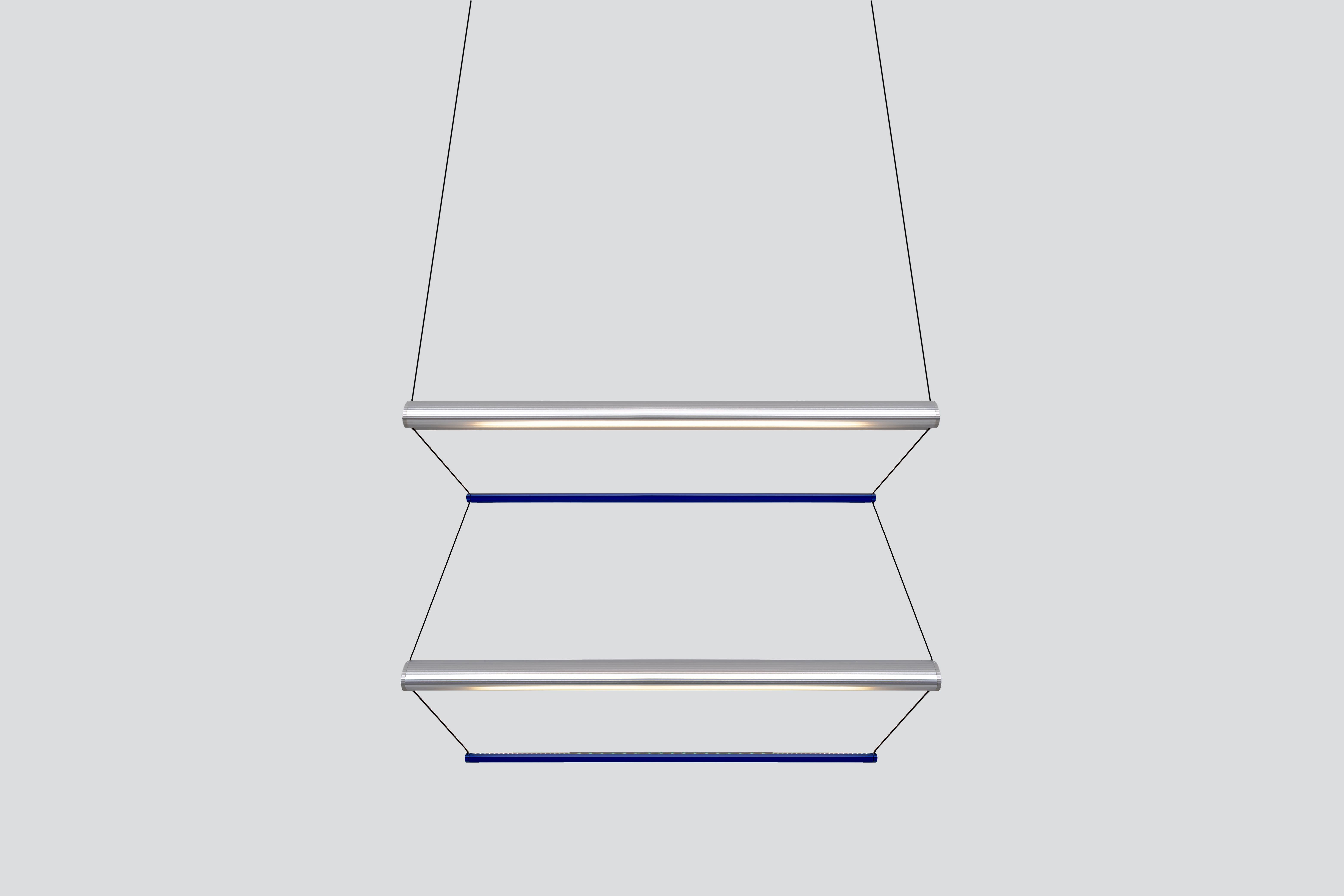 Contemporary Pendant Lamp 'Tier 2', 100, Vertical, Silver and Sapphire by AND
Designer: Lukas Peet

Materials:
- Aluminum

Dimensions:
- 100cm x 70cm x 17.5cm
39.25” x 27.5” x 7”
- Adjustable drop length: 243cm / 96”

Input Voltage:
- 110–120V,