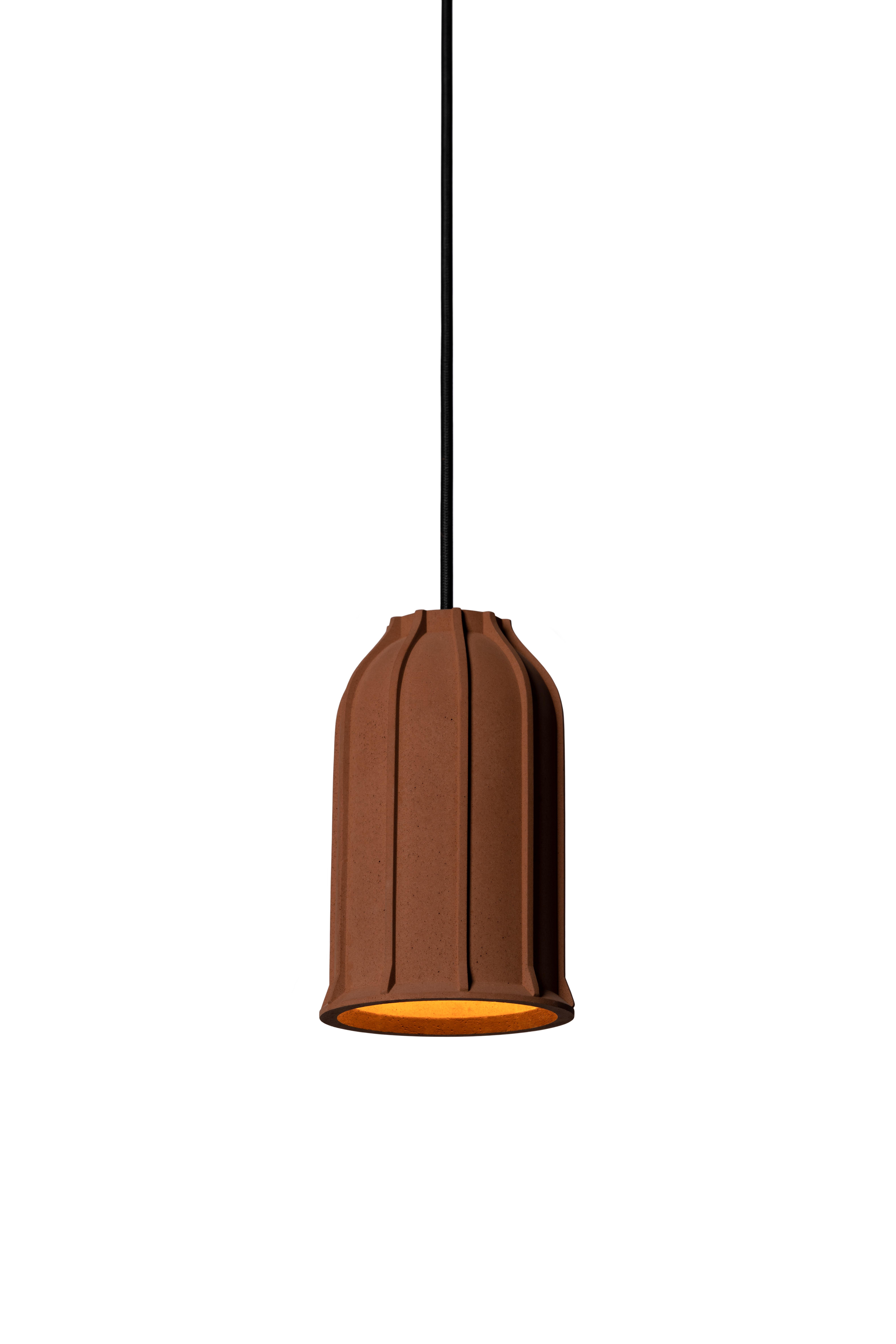 Pendant lamp 'U' by Nongzao x Bentu Design.
Material: Terracotta 
Color: Earthy brown 

Measures: 18.5 cm high, 11.5 cm diameter
Wire: 3 meters (black)
Lamp type: AC 100-240V 50-60Hz  9W - Comptable with US electric system.

Variations:
- Color:
