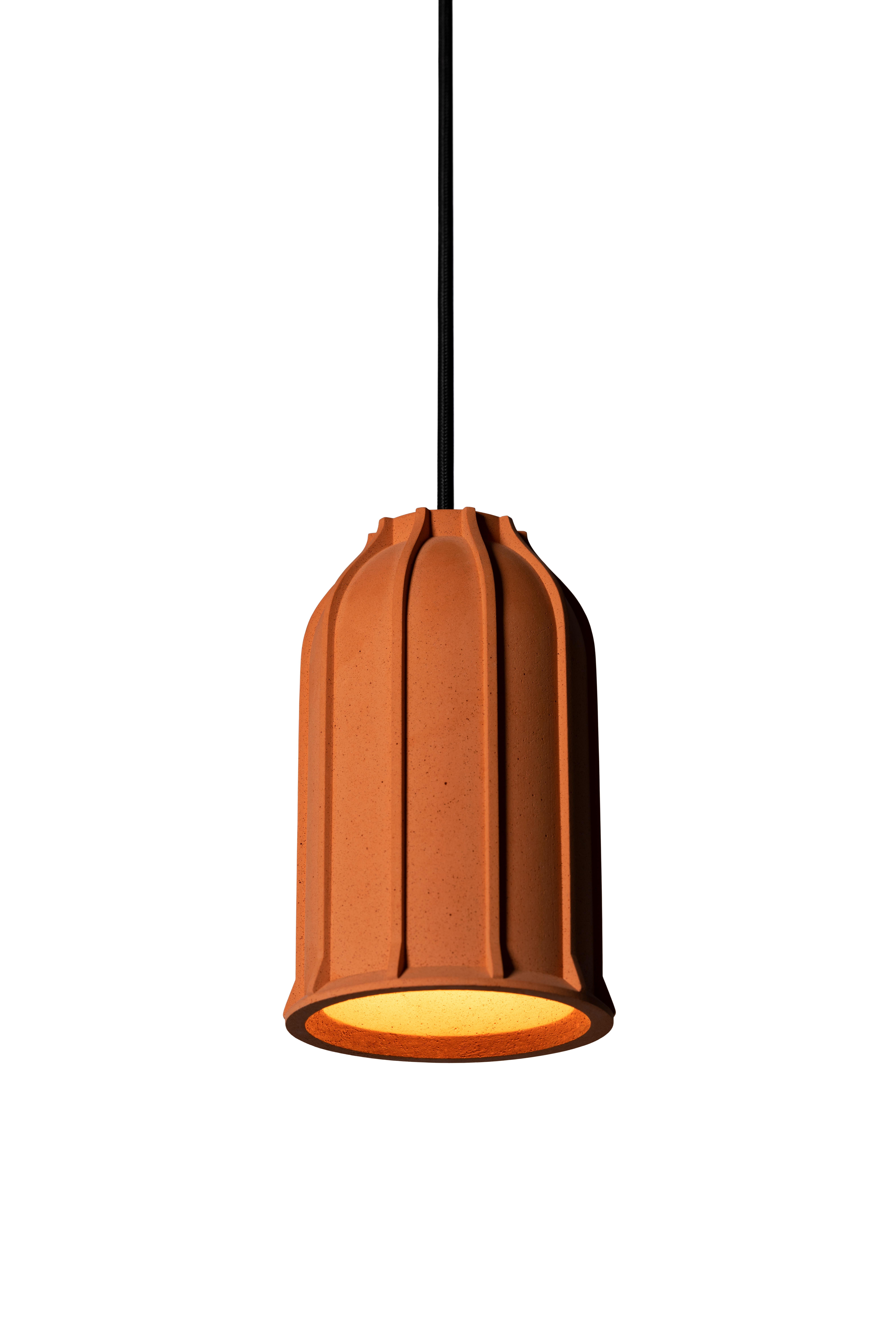 Pendant lamp 'U' by Nongzao x Bentu Design.
Material: Terracotta 
Color: Earthy orange 

Measures: 18.5 cm high, 11.5 cm diameter
Wire: 3 meters (black)
Lamp type: AC 100-240V 50-60Hz 9W - Comptable with US electric system.

Variations:
-