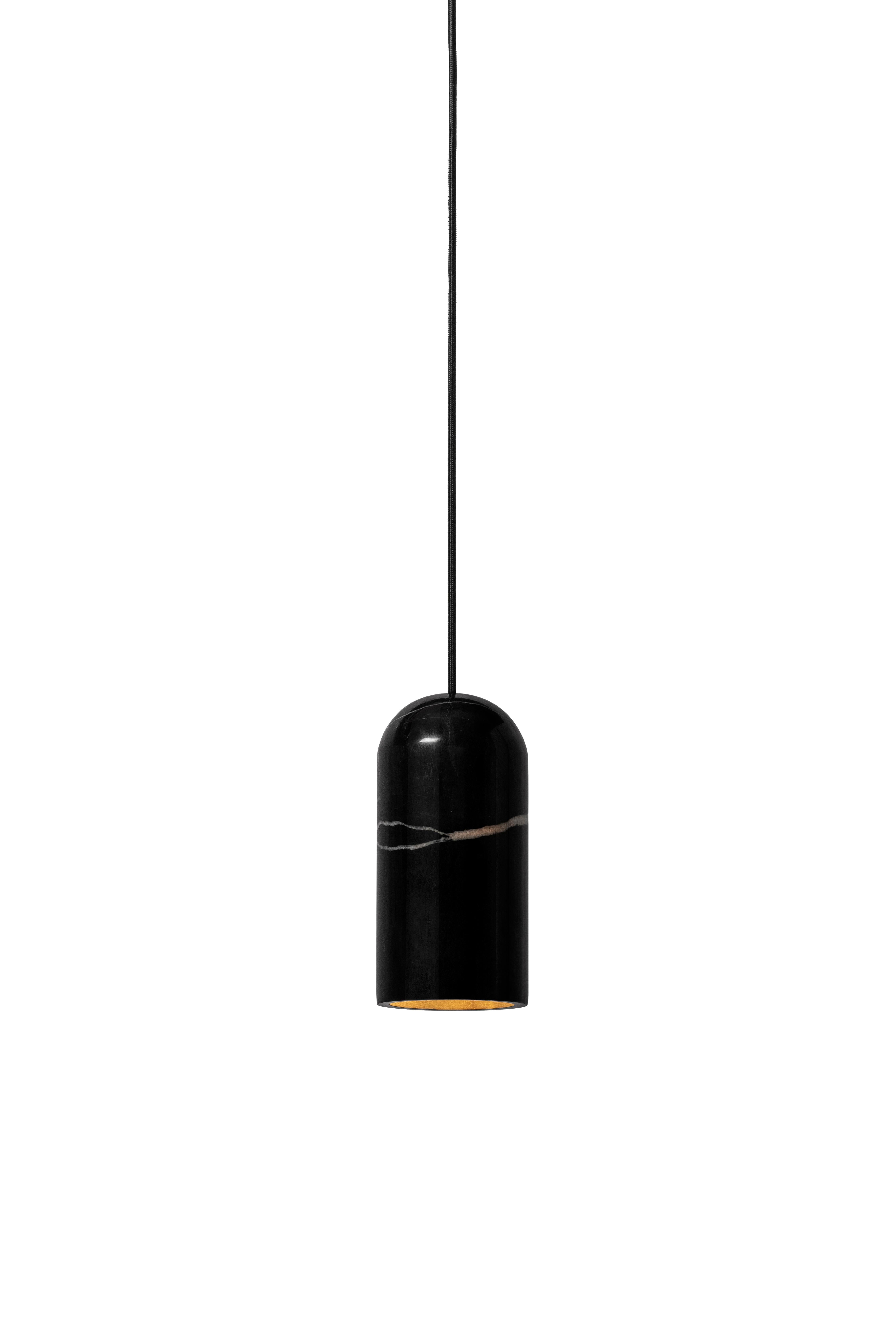 Pendant lamp 'U2' by Buzao x Bentu design.
Black marble

23 cm high, 11 cm diameter
Wire: 2 meters black (adjustable)
Lamp type: E27 LED 3W 100-240V 80Ra 200LM 2700K - Comptable with US electric system.
Ceiling rose: 6.5cm diameter