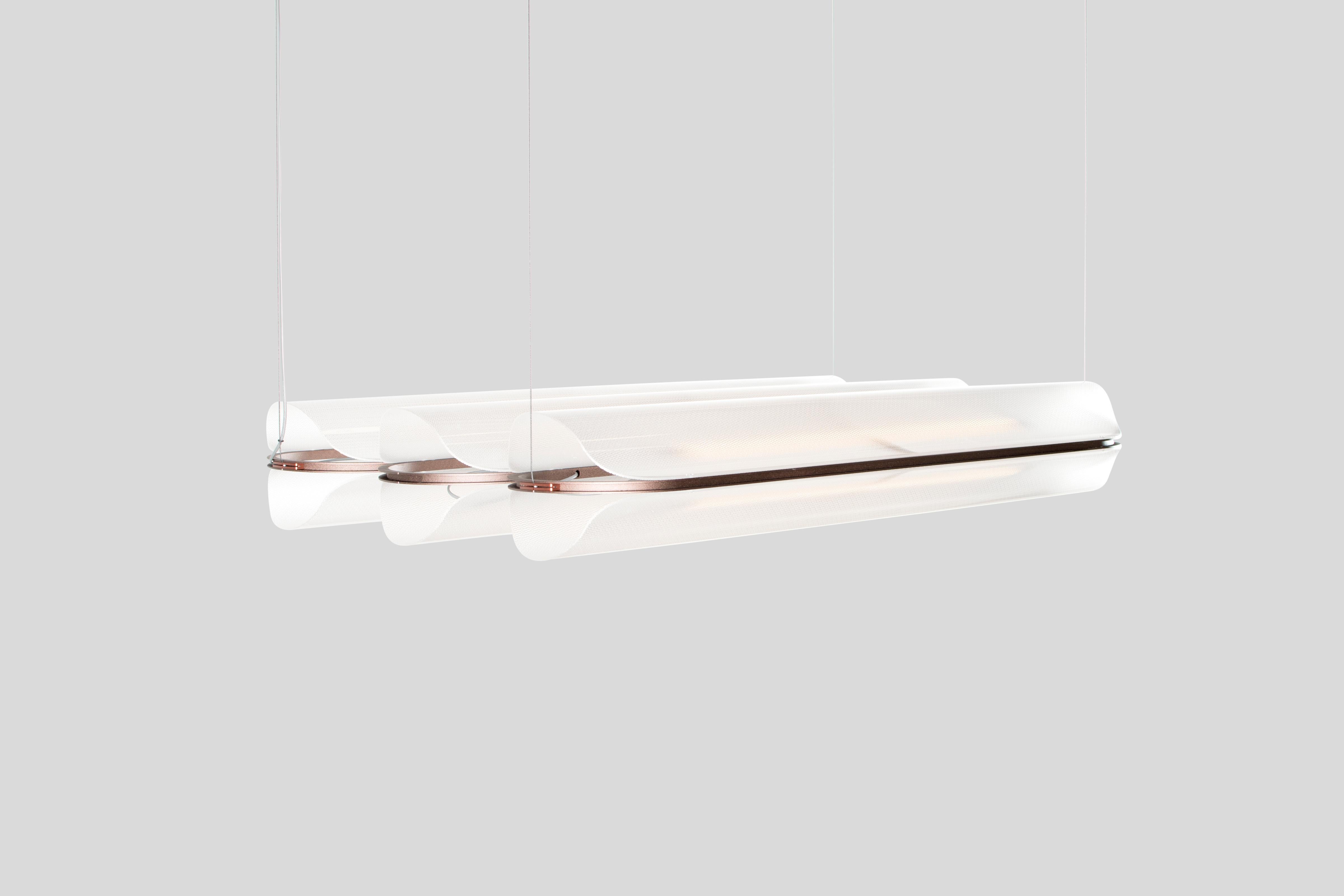 VALE - Pendant lamp
Design: Caine Heintzman, Editor: ANDLight

The Vale series optimises functionality through its multidirectional luminescence while diffusing soft ambient light.

Materials:
– Acrylic
– Aluminum

Dimensions:
102 x 30 x