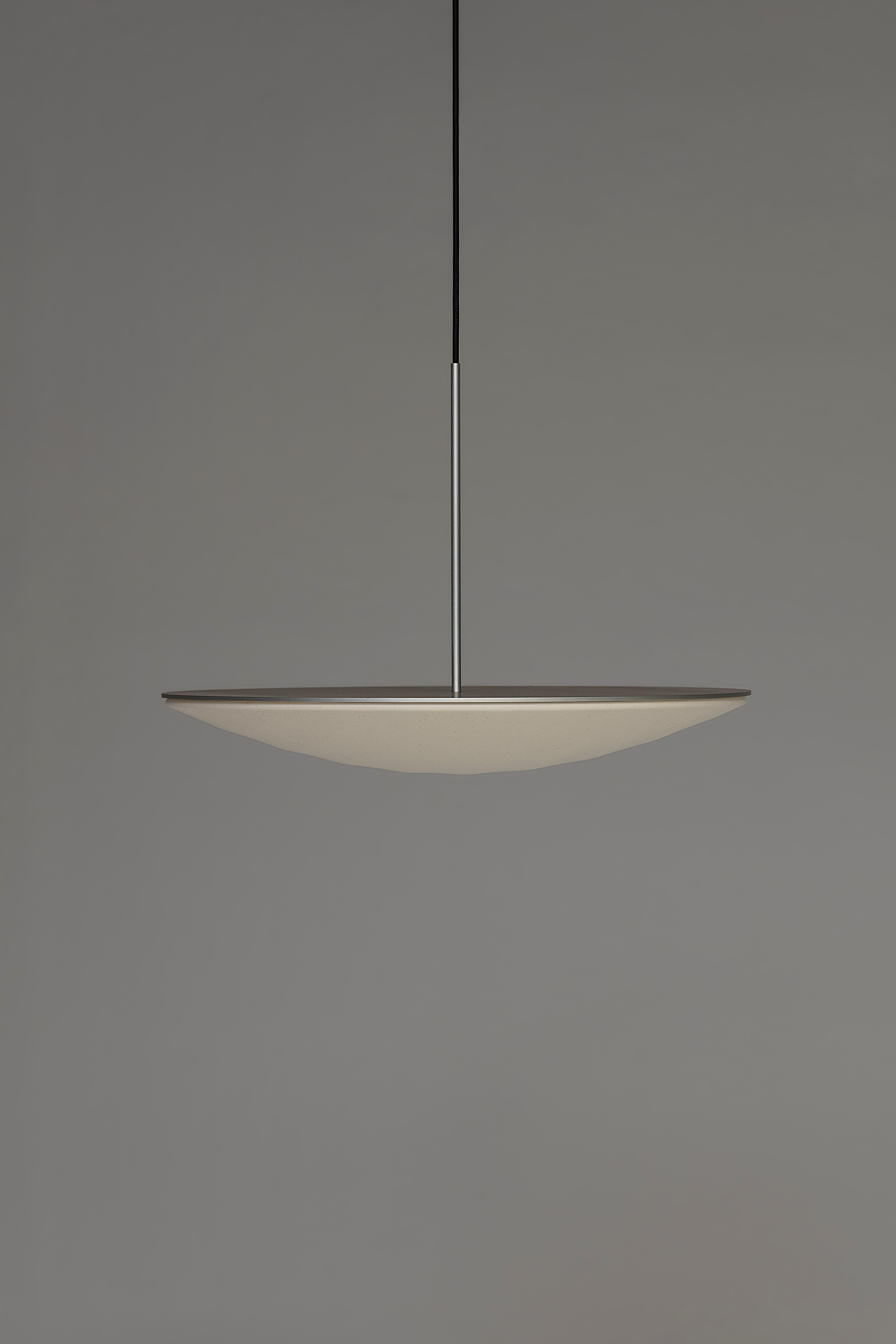 Voyage Pendant lamp by Bymars x AGO Lighting
Silver

Materials: Aluminum, Cotton fabric, PMMA 
Light Source: Integrated LED (SMD), DC
Watt. 24 W 
Color temp. 2700 / 3000K
Cable Length: 3m 

Dimensions:
H. 40 cm x D. 56.3 cm 

VOYAGE the
