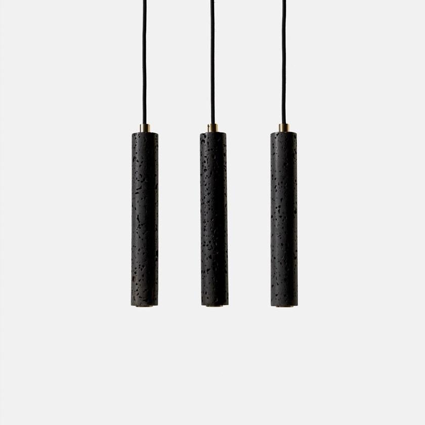 Pendant lamps 'Bang' by Buzao x Bentu Design. 
After concrete and terrazzo versions, let's meet the black lava stone and white marble versions!

(Sold individually)

31 cm High; 4,5 cm Diameter
Wire: 2 Meters Black (adjustable)

Brass (gold) or