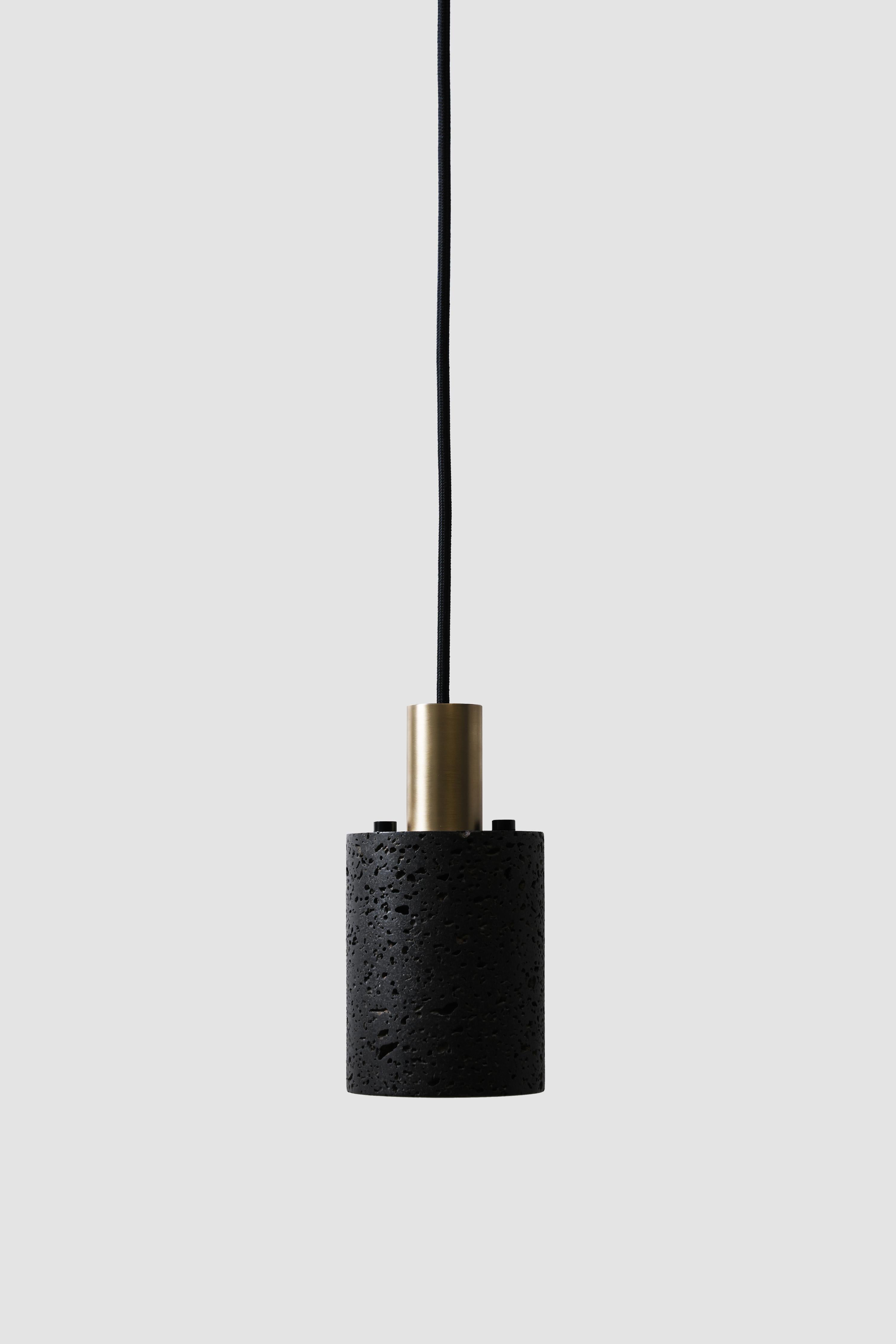 Pendant lamps 'N' by Buzao x Bentu design.

Black lava stone or white marble
Black (aluminum or gold brass) finish

(Sold individually)

19.5 cm high, 10 cm diameter
Wire: 2 meters black (adjustable) 

Lamp type: E27 LED 3W 100-240V 80Ra 200LM