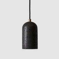 Contemporary pendant lamps 'U' in black lava stone