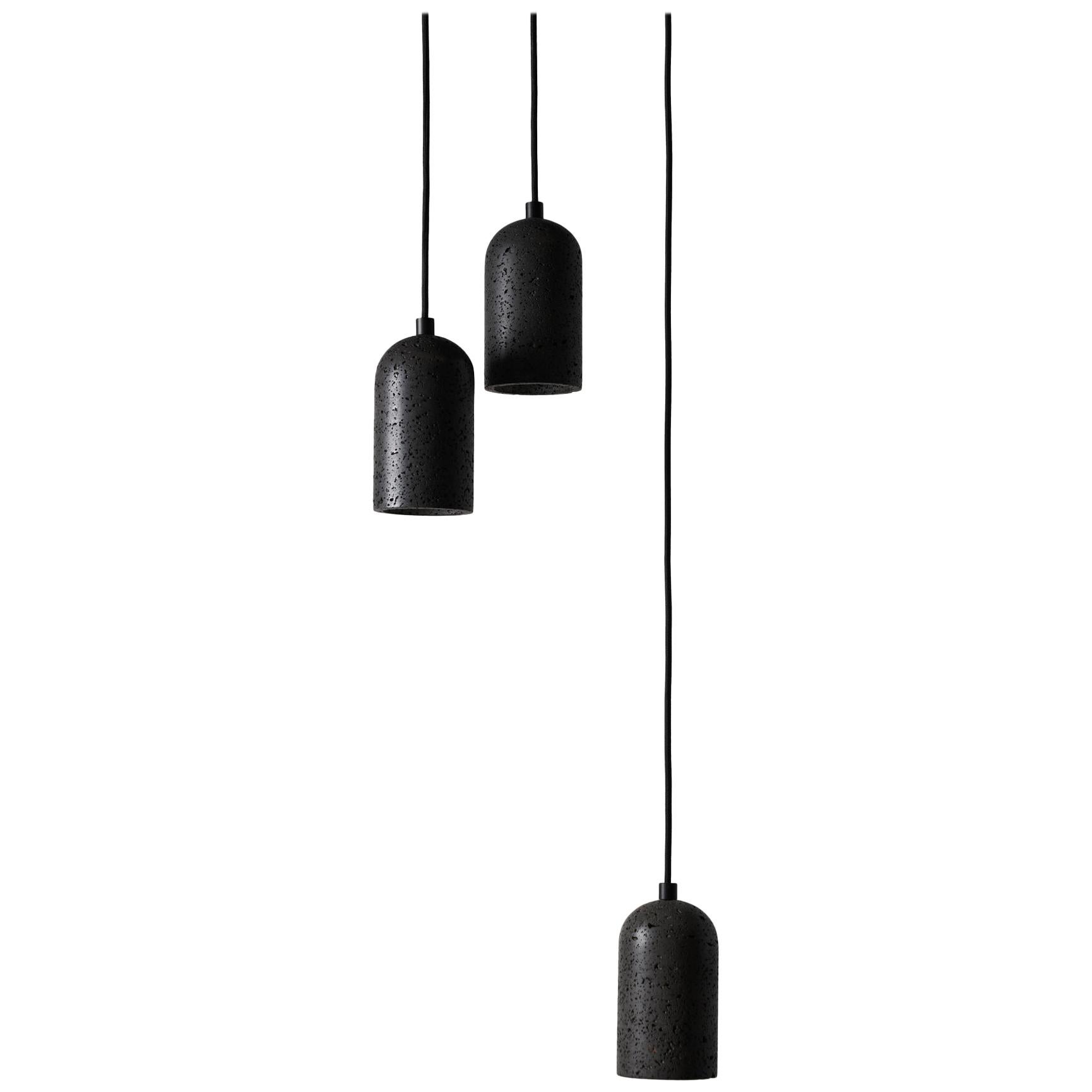 Contemporary pendant lamps 'U' in black lava stone