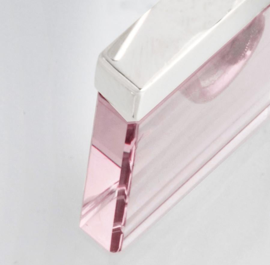This designer Ink pendant features a big 15x15x3 mm pink onyx in sterling silver. The Ink collection has been featured in Harper's Bazaar and Vogue UA published issues.

The pendant gives off a delicate light due to the natural rose onyx stone, cut