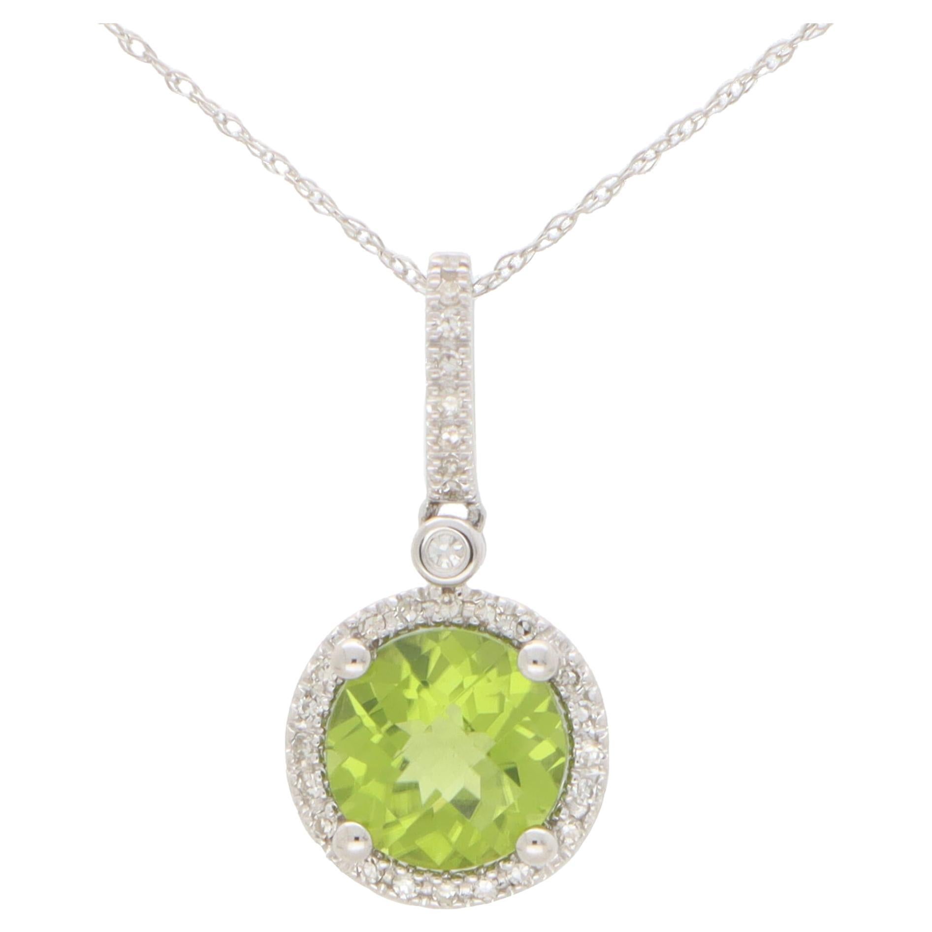 Contemporary Peridot and Diamond Halo Pendant Necklace in 14k White Gold For Sale