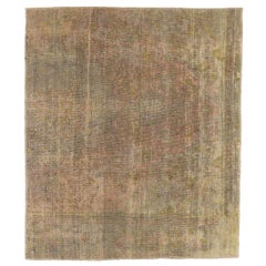 Contemporary Persian Overdye Rug with Faded Pink 
Gold Floral Details