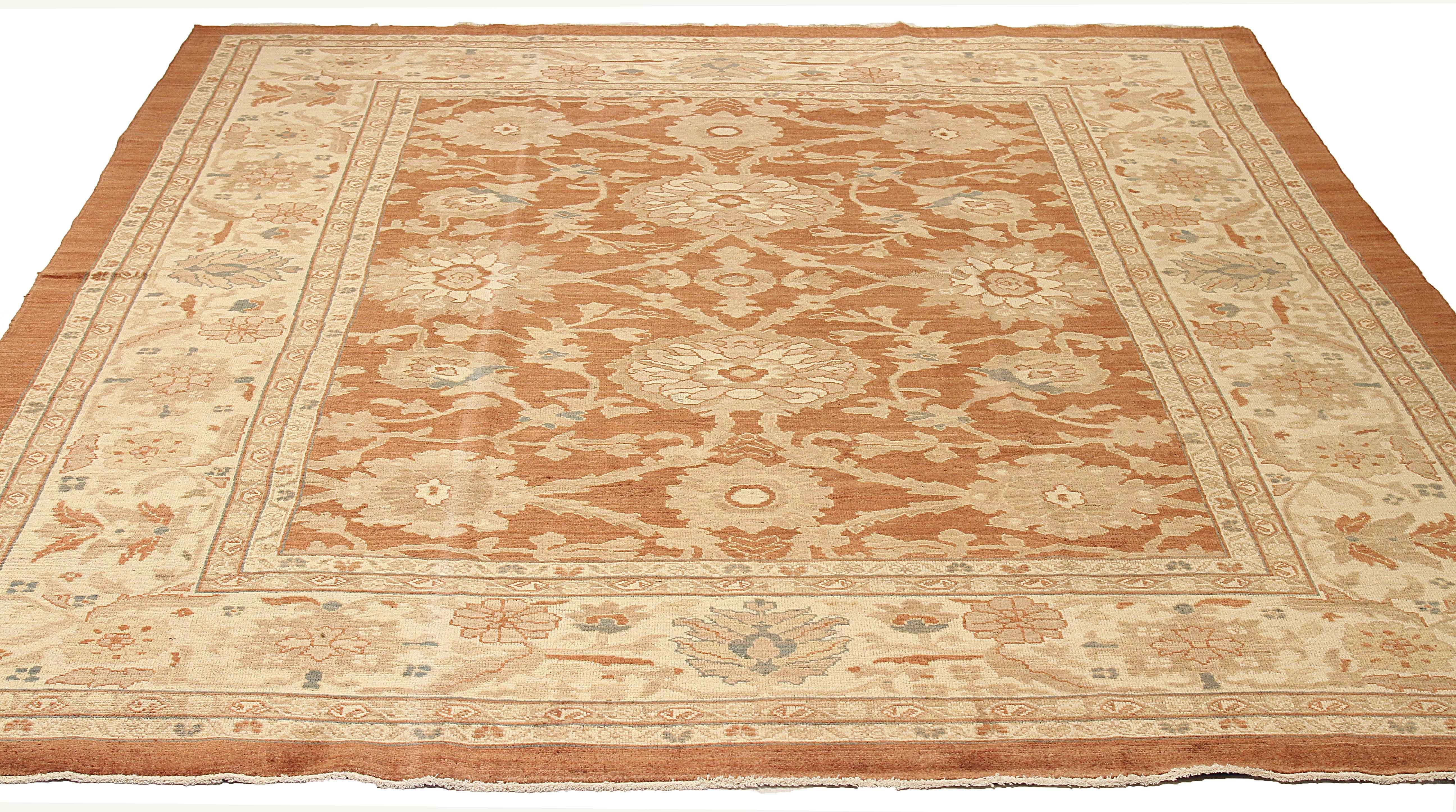 Contemporary handmade Persian area rug from high-quality sheep’s wool and colored with eco-friendly vegetable dyes that are proven safe for humans and pets alike. It’s a Classic Sultanabad design showcasing a regal brown and ivory field with