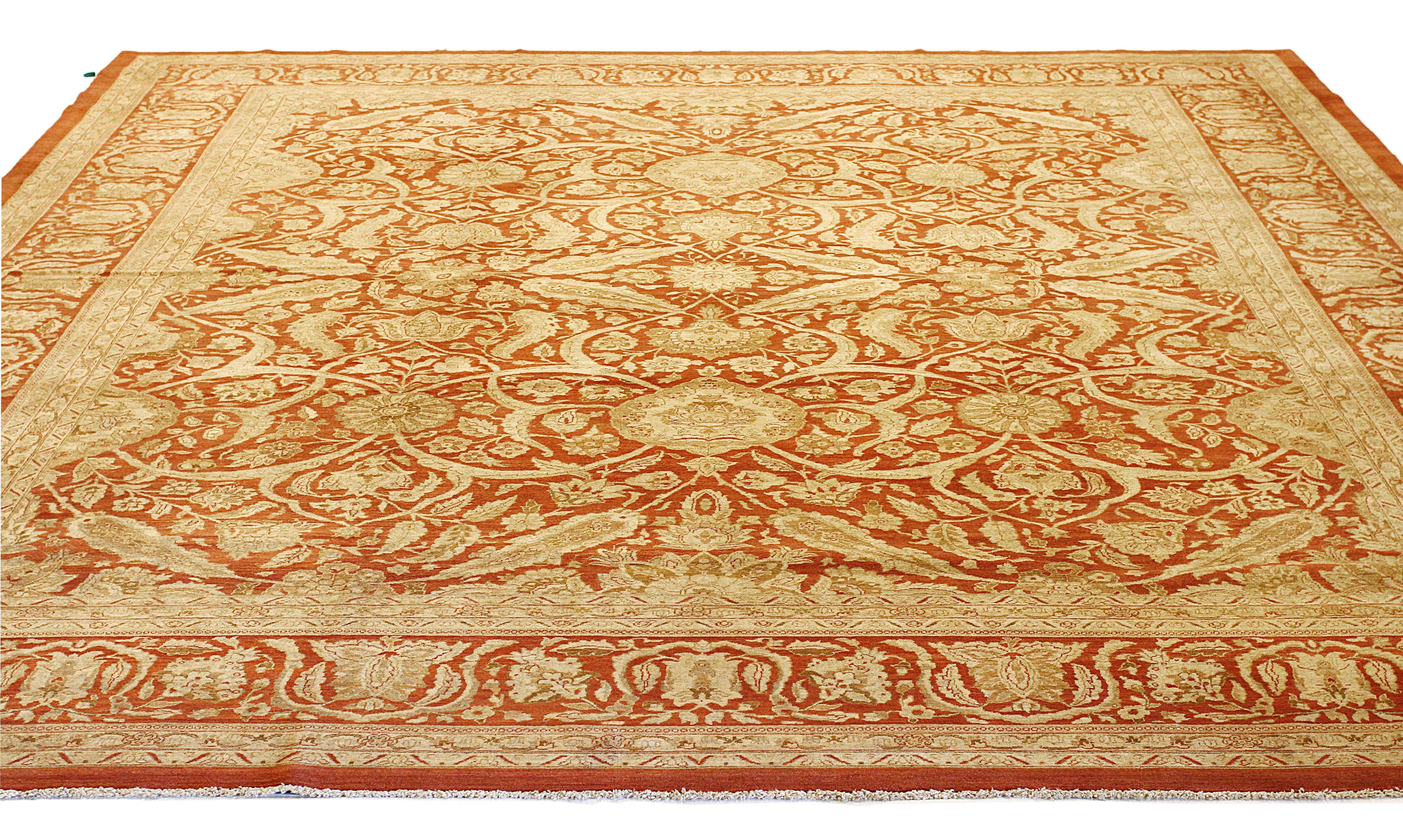 Contemporary Persian rug handwoven from the finest sheep’s wool and colored with all-natural vegetable dyes that are safe for humans and pets. It’s a traditional Tabriz weaving featuring a lovely ensemble of floral designs in beige and ivory over a