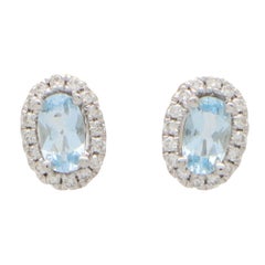 Contemporary Petite Aquamarine and Diamond Halo Stud Earrings in 18k White Gold