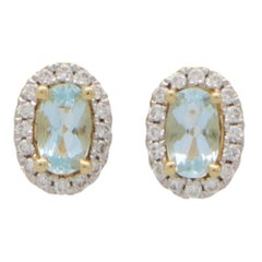 Contemporary Petite Aquamarine and Diamond Halo Stud Earrings in Yellow Gold