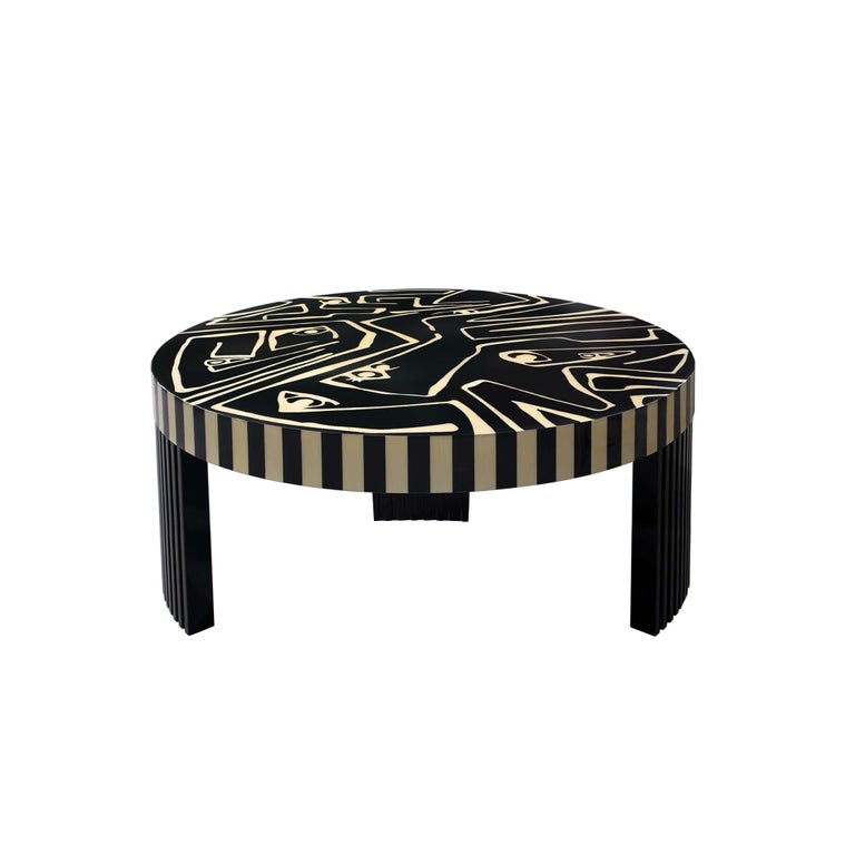 Picasso Center Table celebrates the 20th-century art movement, Cubism, with handcraft expertise and his leader Pablo Picasso. Rough and natural materials approach us with an exact message: modest luxury. This artistic yet modern coffee table invites