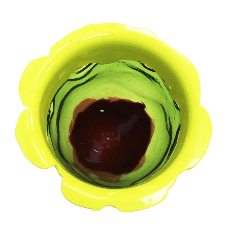 The “Flower” vase, designed by Gaetano Pesce as part of his celebrated Fish Collection, is a sculptural object crafted entirely in hand-poured resin, a signature technique of the designer. Each piece features organic variations in color, texture and