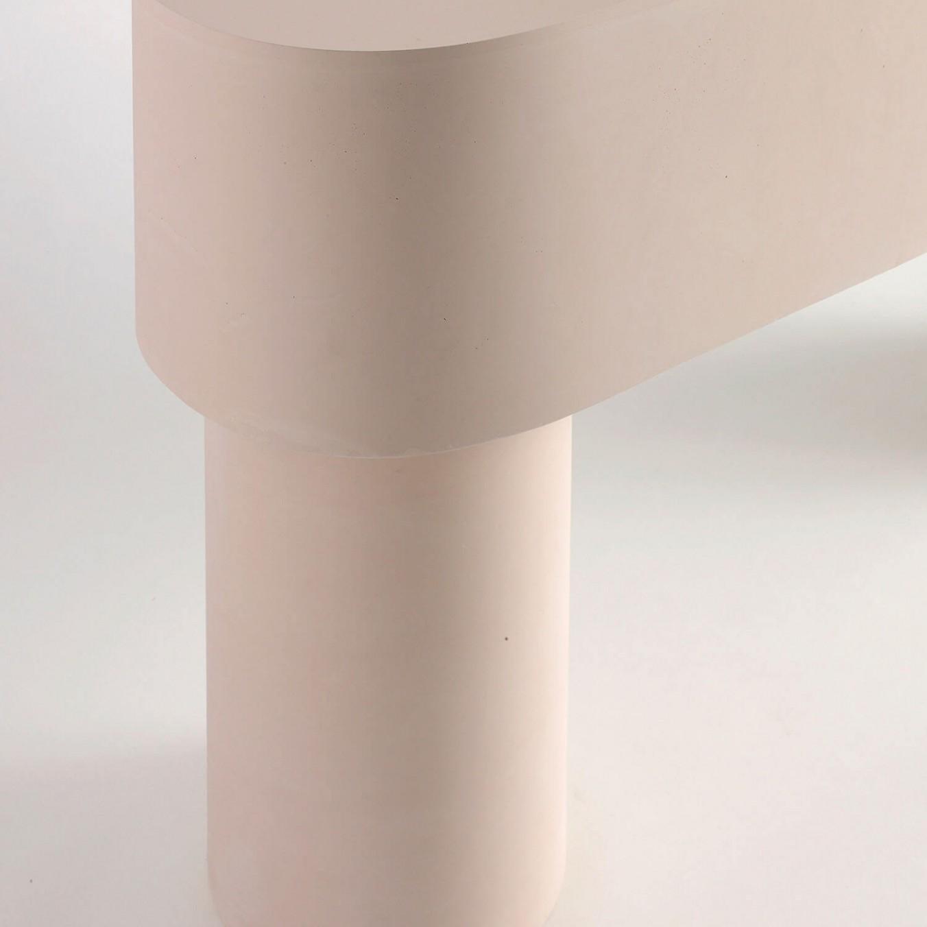 Contemporary Jesmonite Console - Pilotis console table by Malgorzata Bany.

Inspired by support columns that lift a building above ground or water. Each piece is formed using a mould made of paper, used only once, making each piece unique.