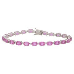 Contemporary Pink Sapphire and Diamond Line Tennis Bracelet in 18k White Gold