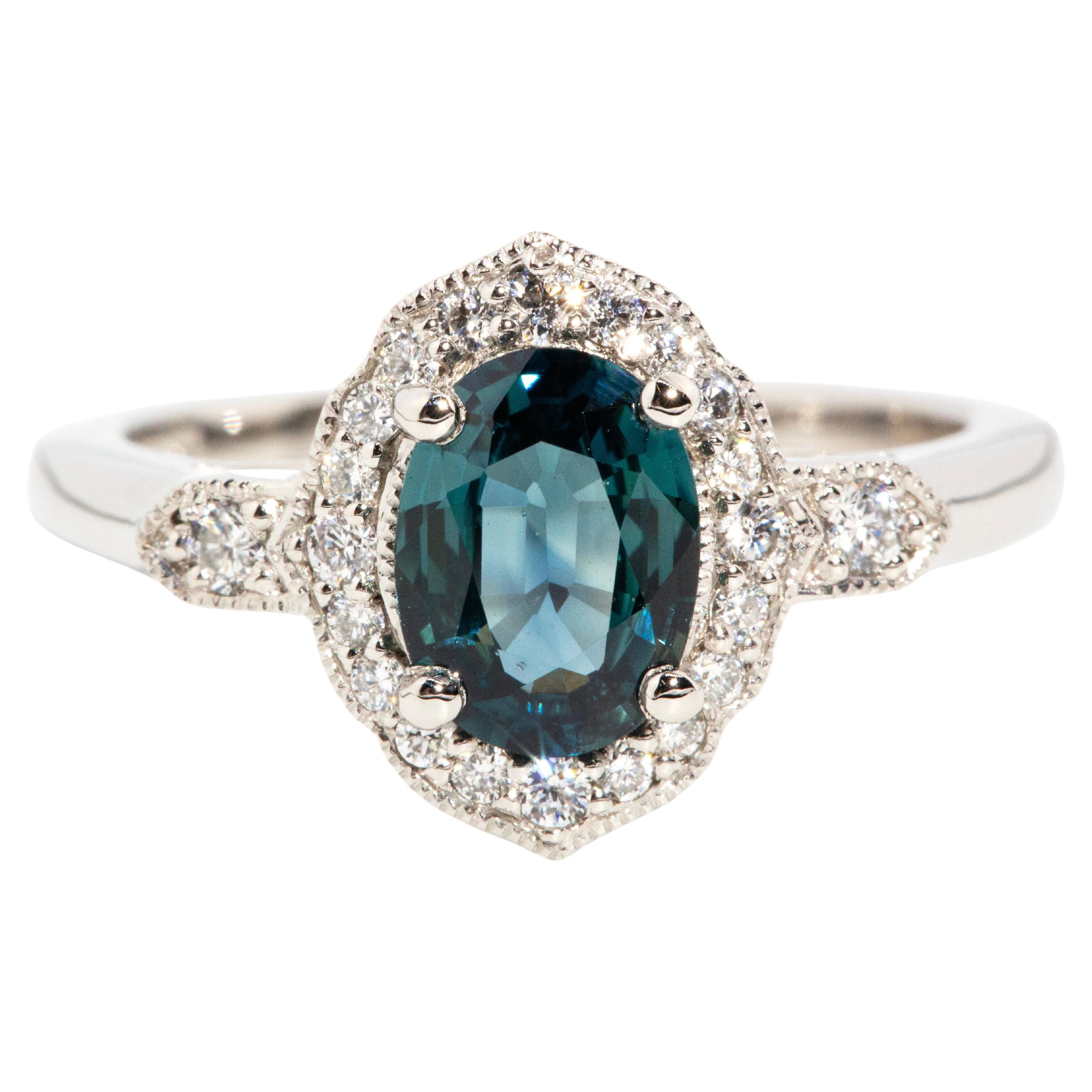 Contemporary Platinum Oval Teal Sapphire & Diamond Halo Milgrain Cluster Ring For Sale