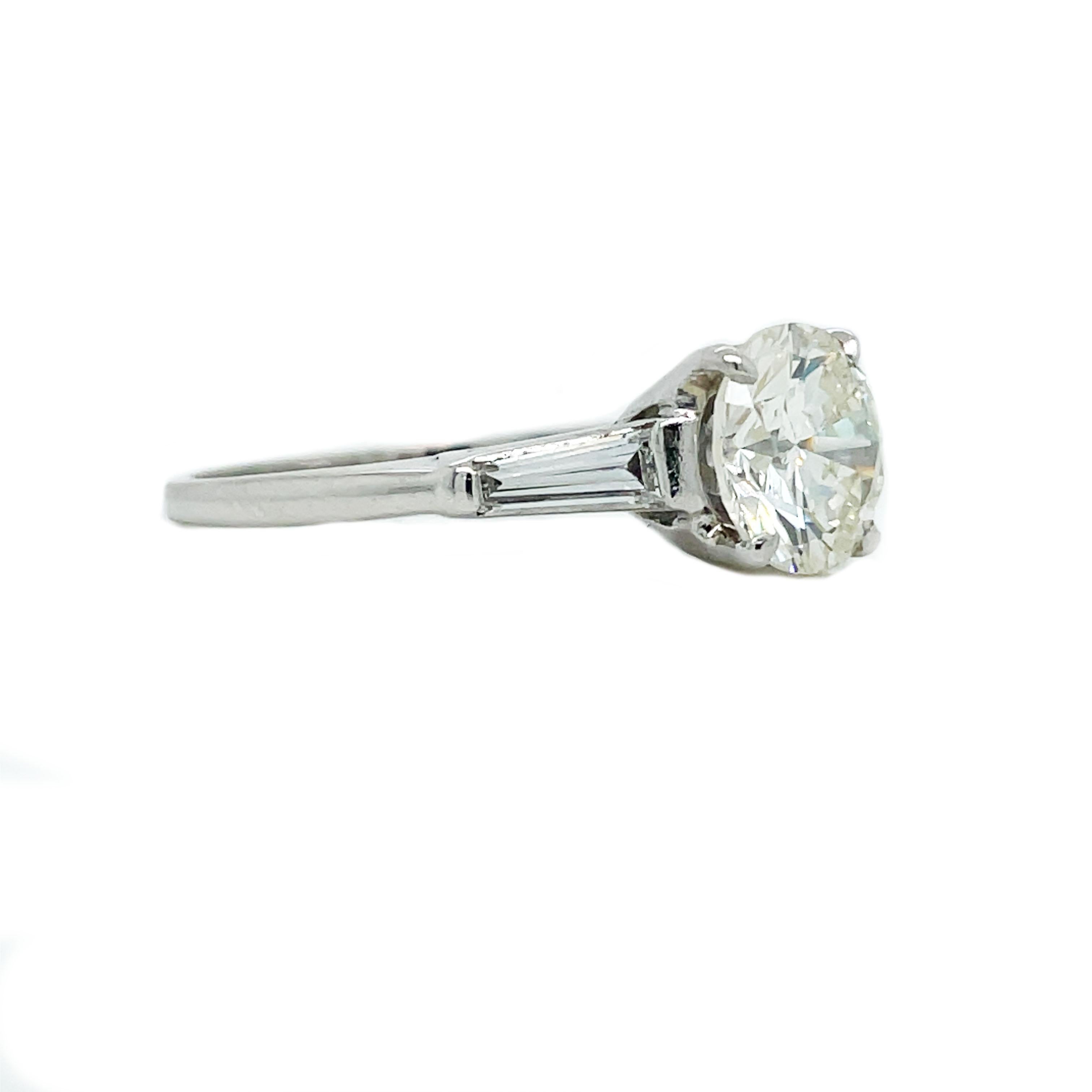 Contemporary Platinum Round and Baguette Diamond Ring with GIA Report For Sale 1