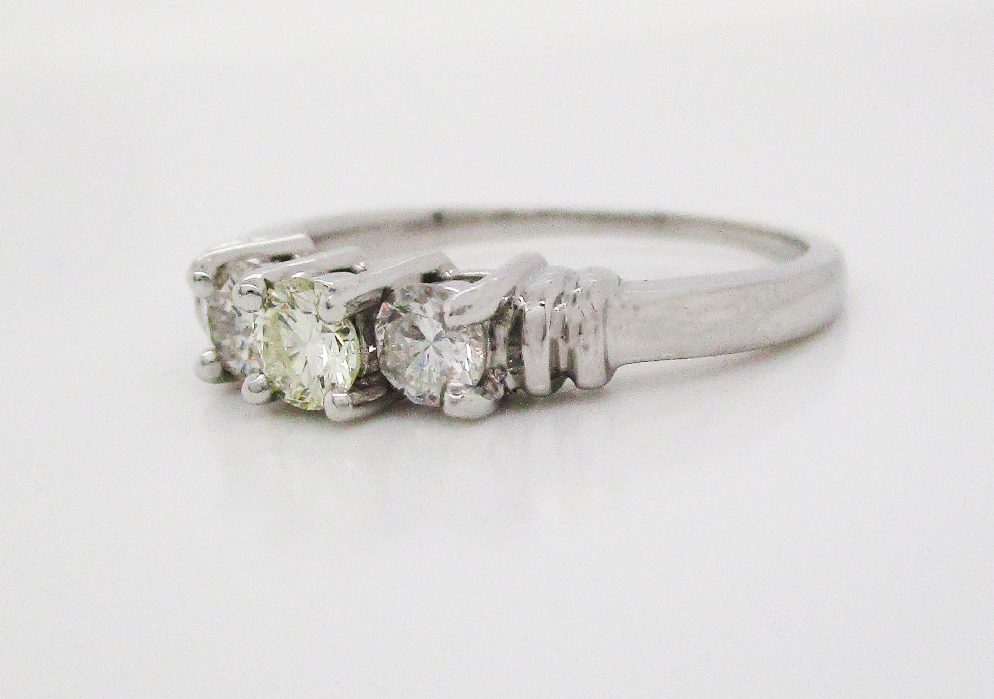 Modern Contemporary Platinum Three-Stone Diamond Engagement Ring